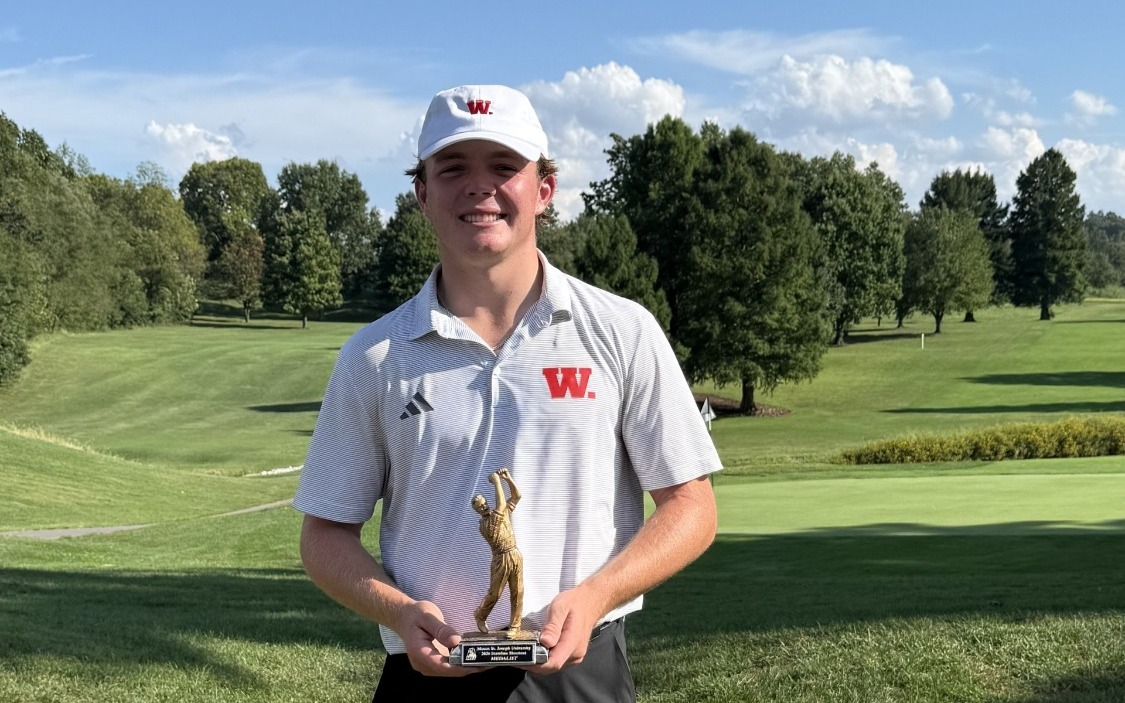 Leo Dellinger with the medalist trophy from the 2026 Stateline Shootout golf tournament.