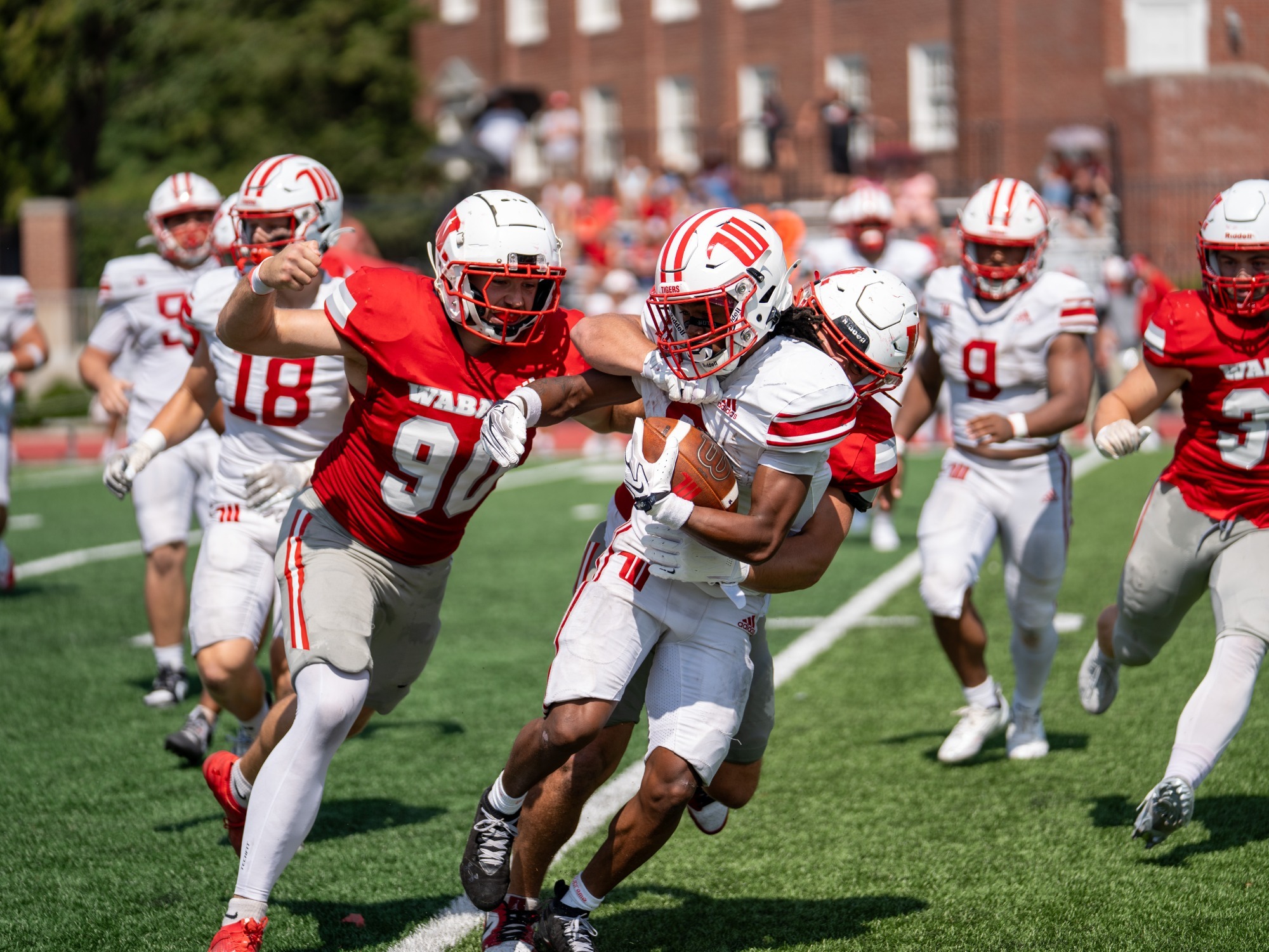 Camden Singer closes in on a Wittenberg ball carrier