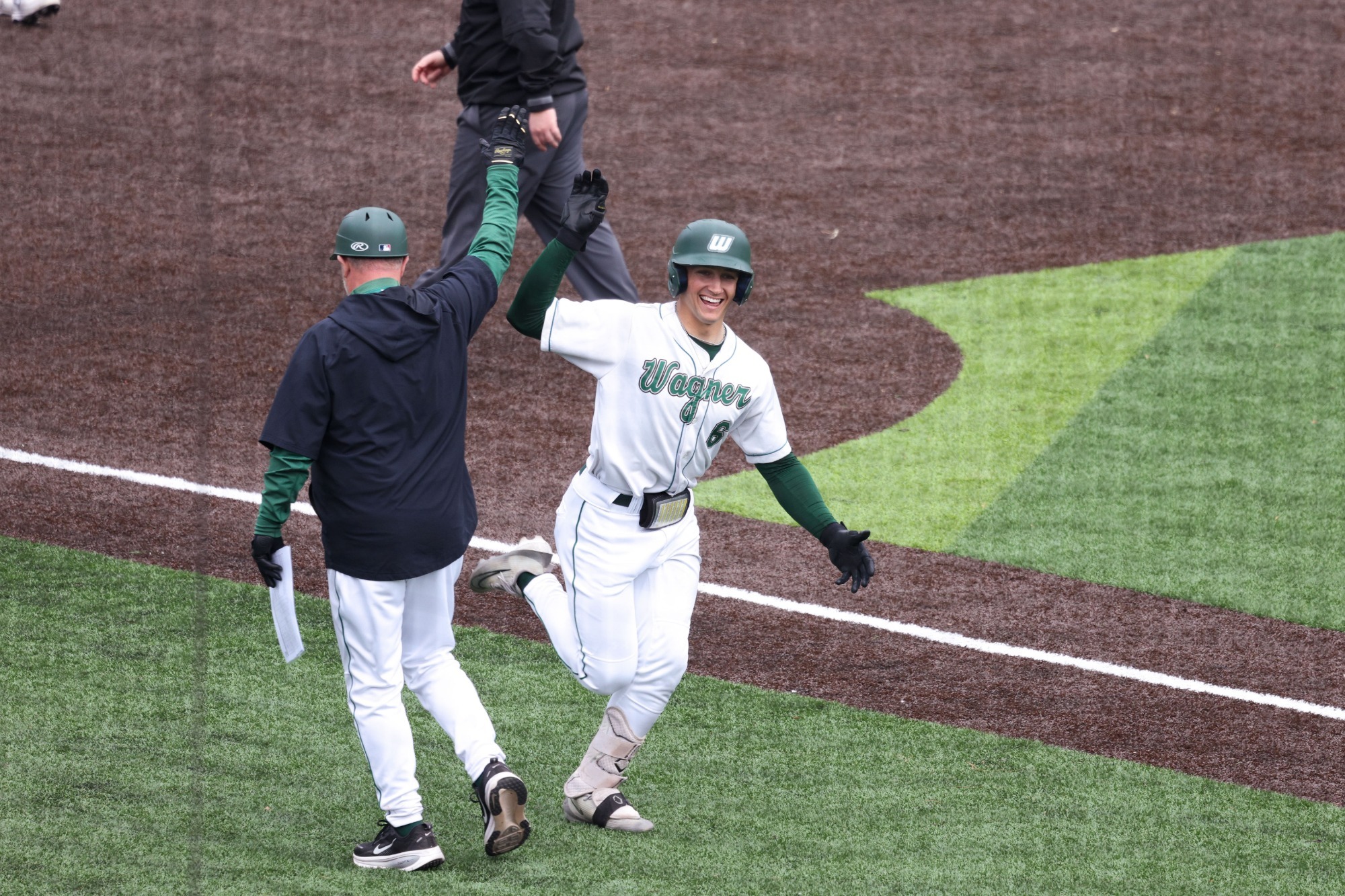 Jackson Blakley celebrates a home run hit against Le Moyne 3/22/26