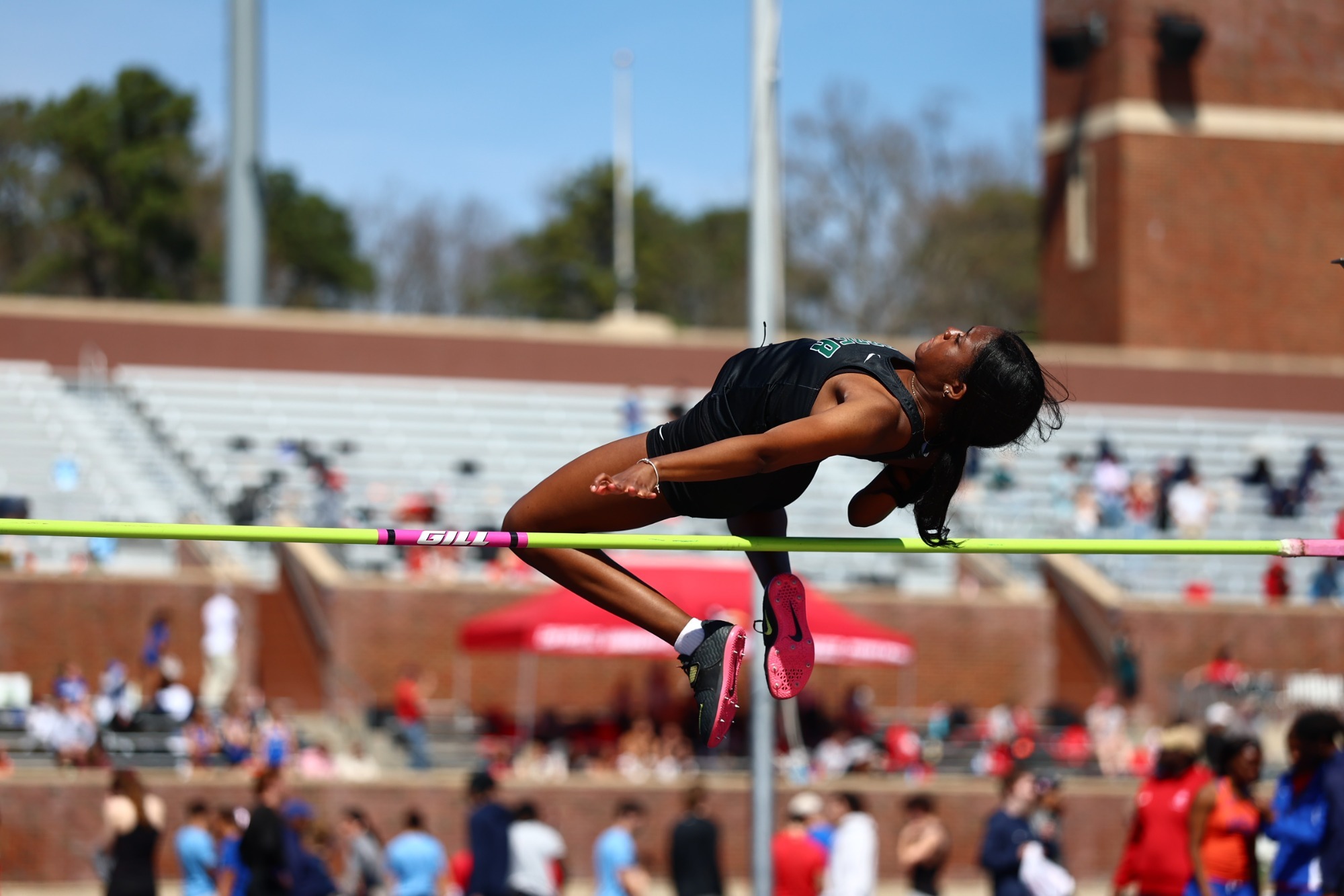 Rikayla Bingham high jumping at the Fred Hardy Invitational 