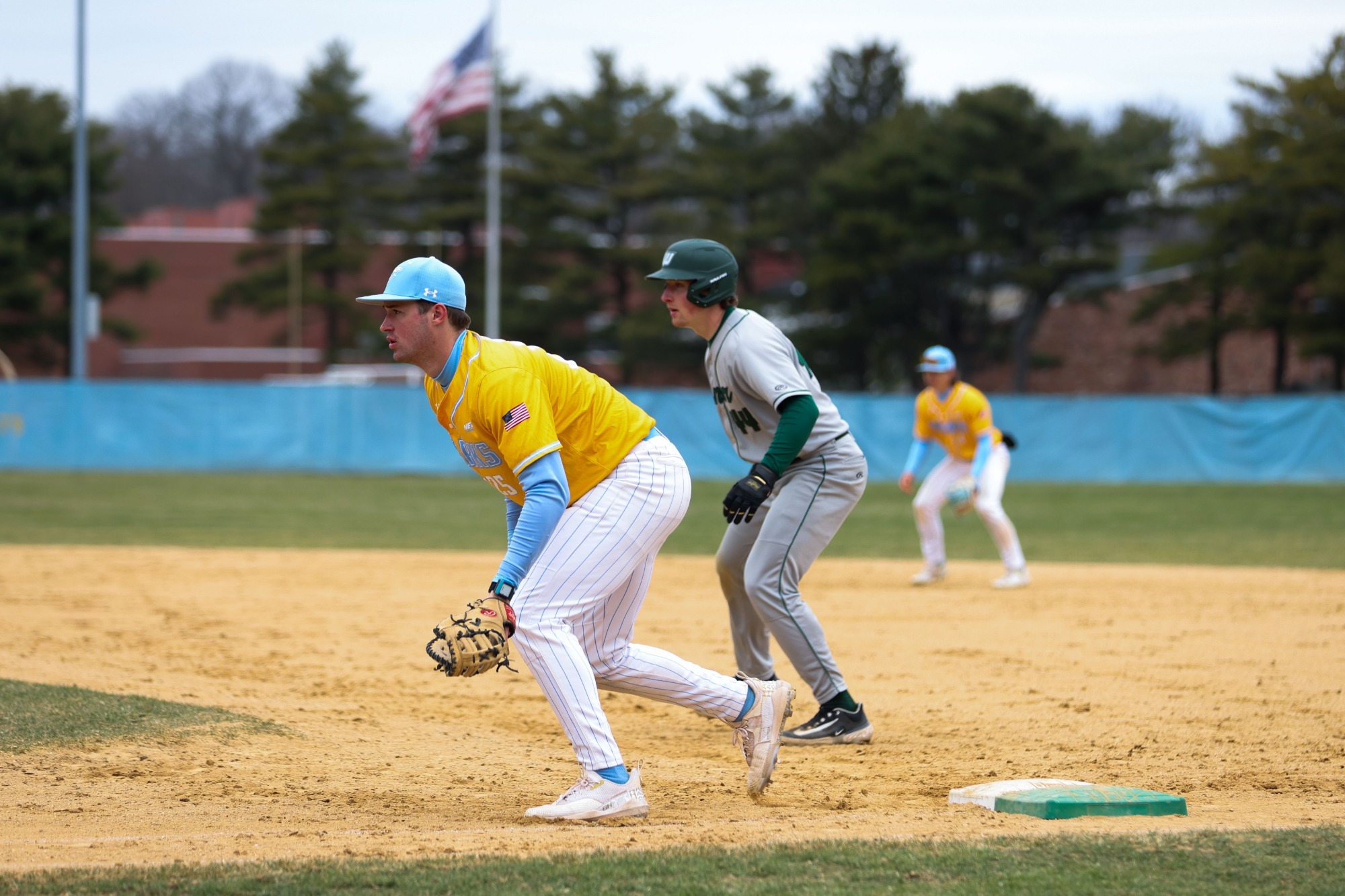 Brendan McLoughlin stands on first against LIU