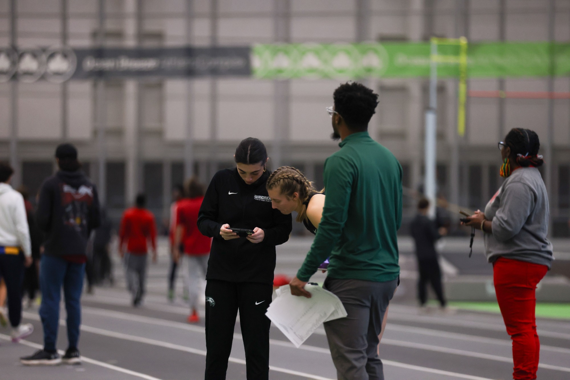 Head coach Marvin Azor works with athletes at the Seahawk Shootout 12/12