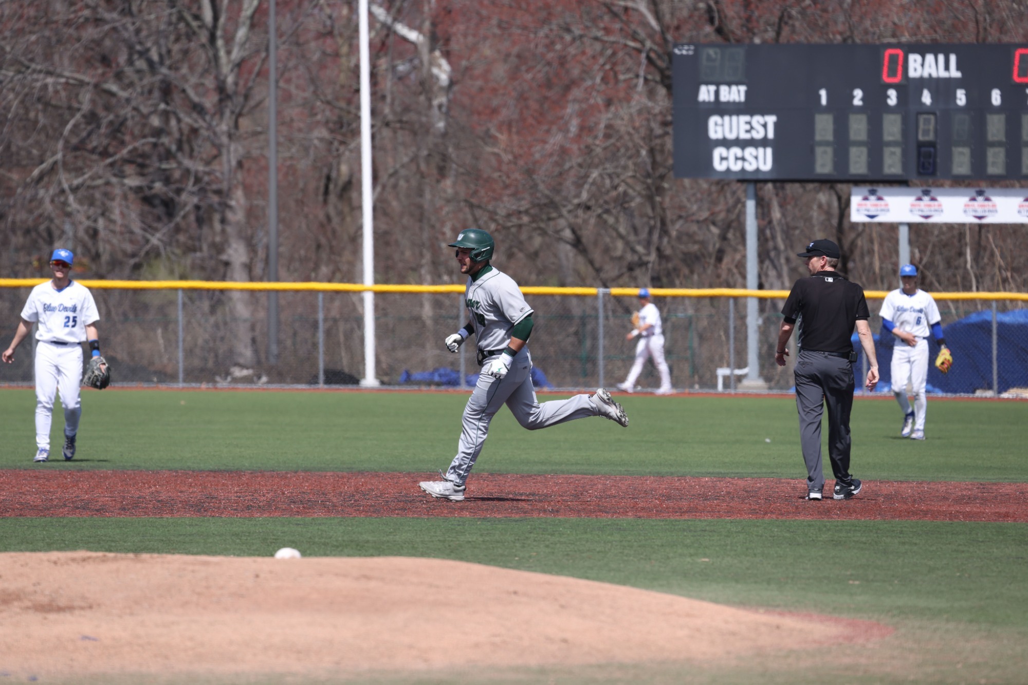Joseph Mennella celebrates a home run at CCSU
