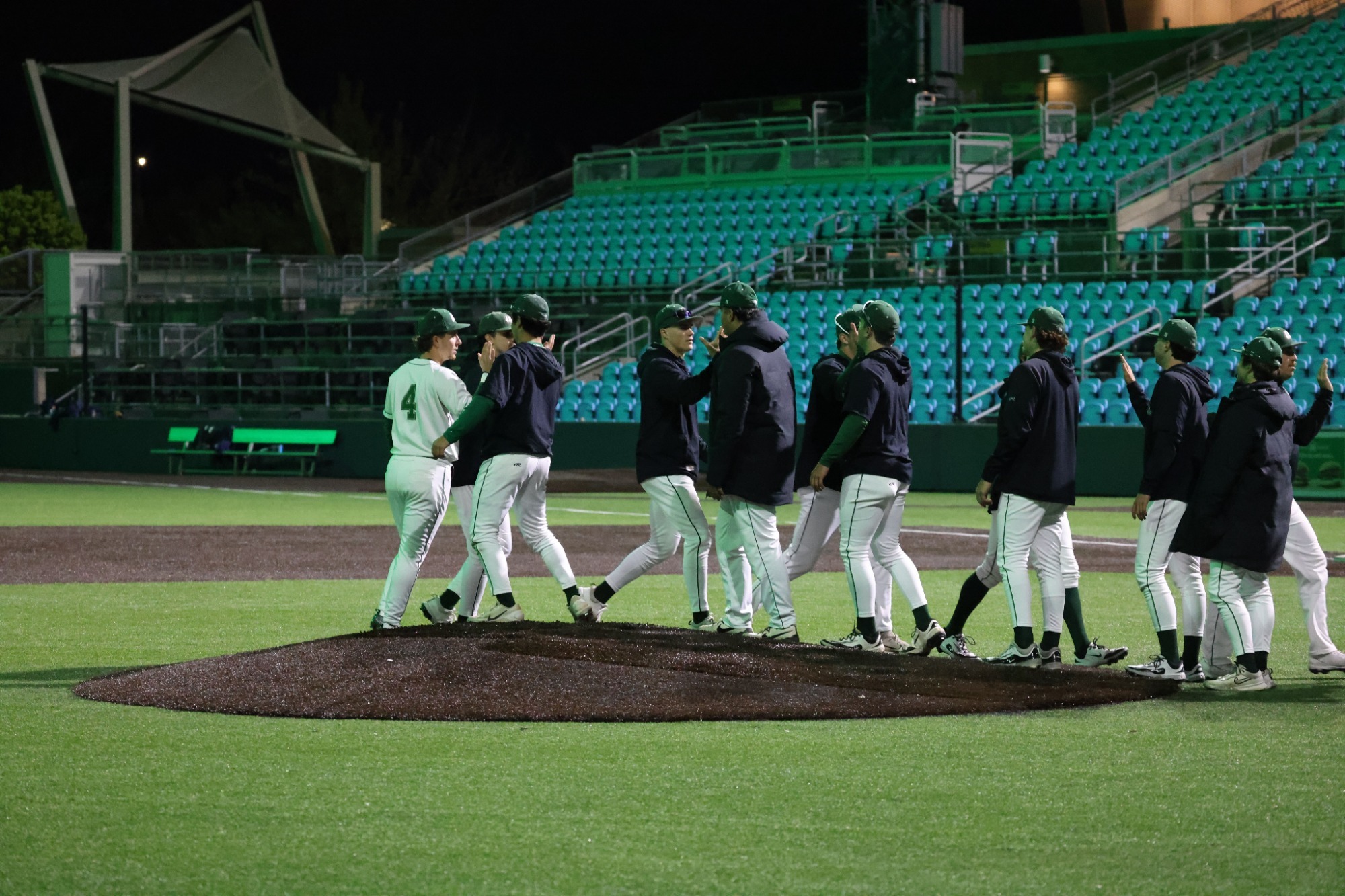 Baseball celebrates a win over Saint Peter's 3/28