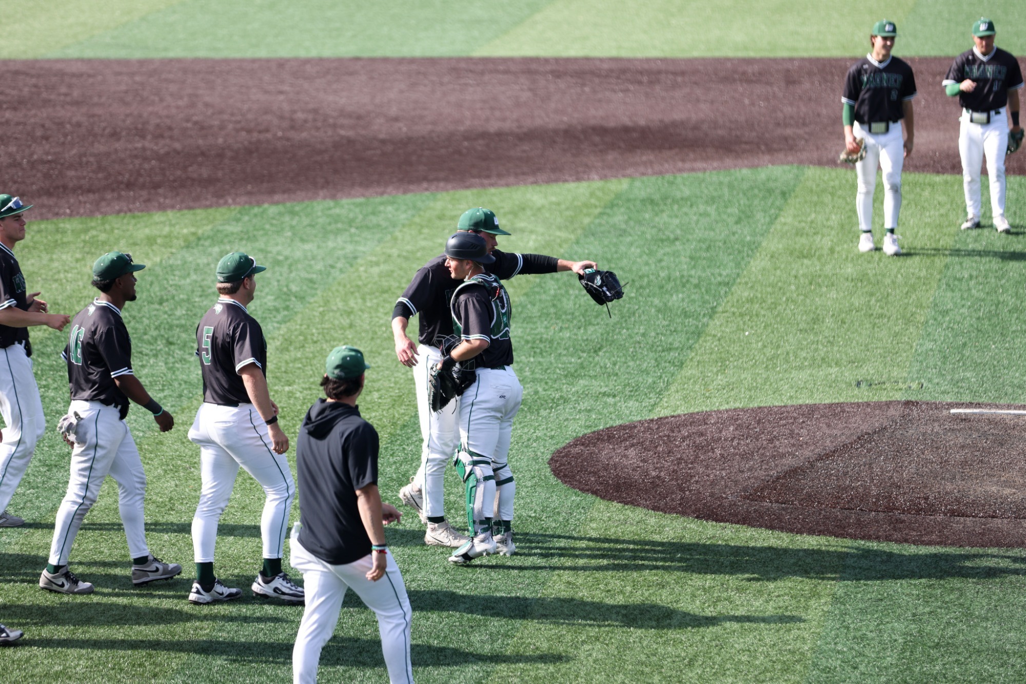 Matthew Moconyi and Andrew Marquis celebrate after a win over Mercyhurst 5/15/26