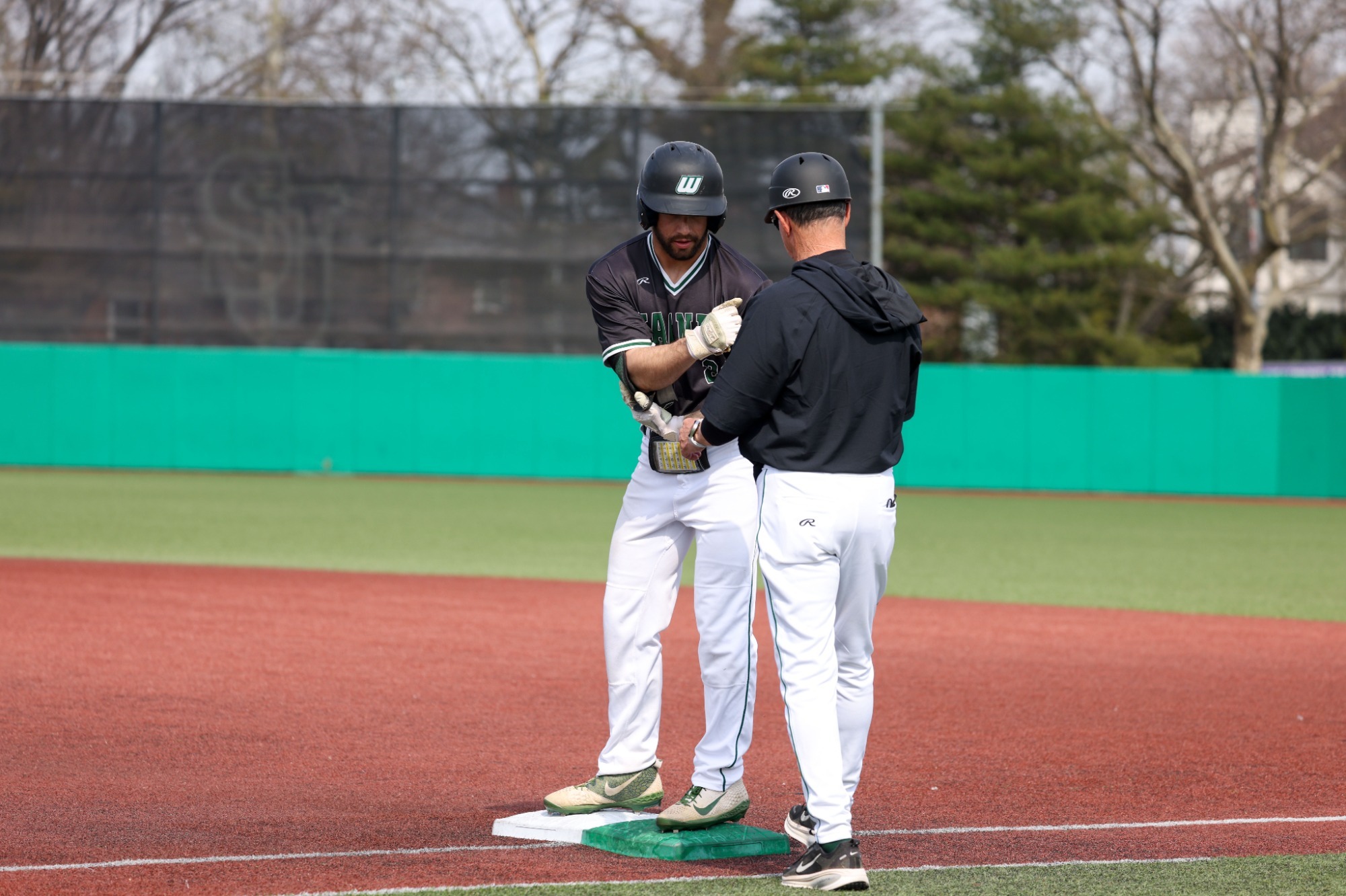 Lukas Torres celebrates his 200th career hit at St. John's