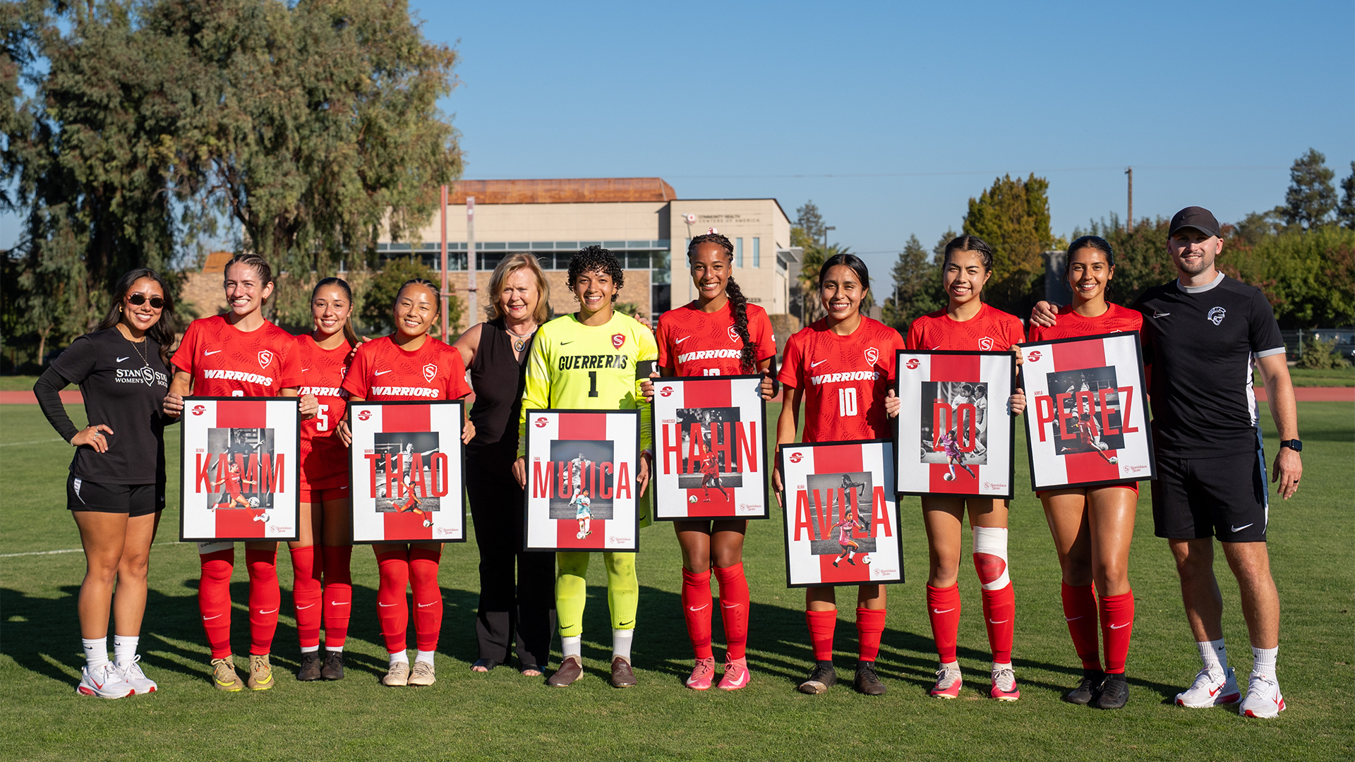Seniors with President Dr. Britt Rios-Ellis