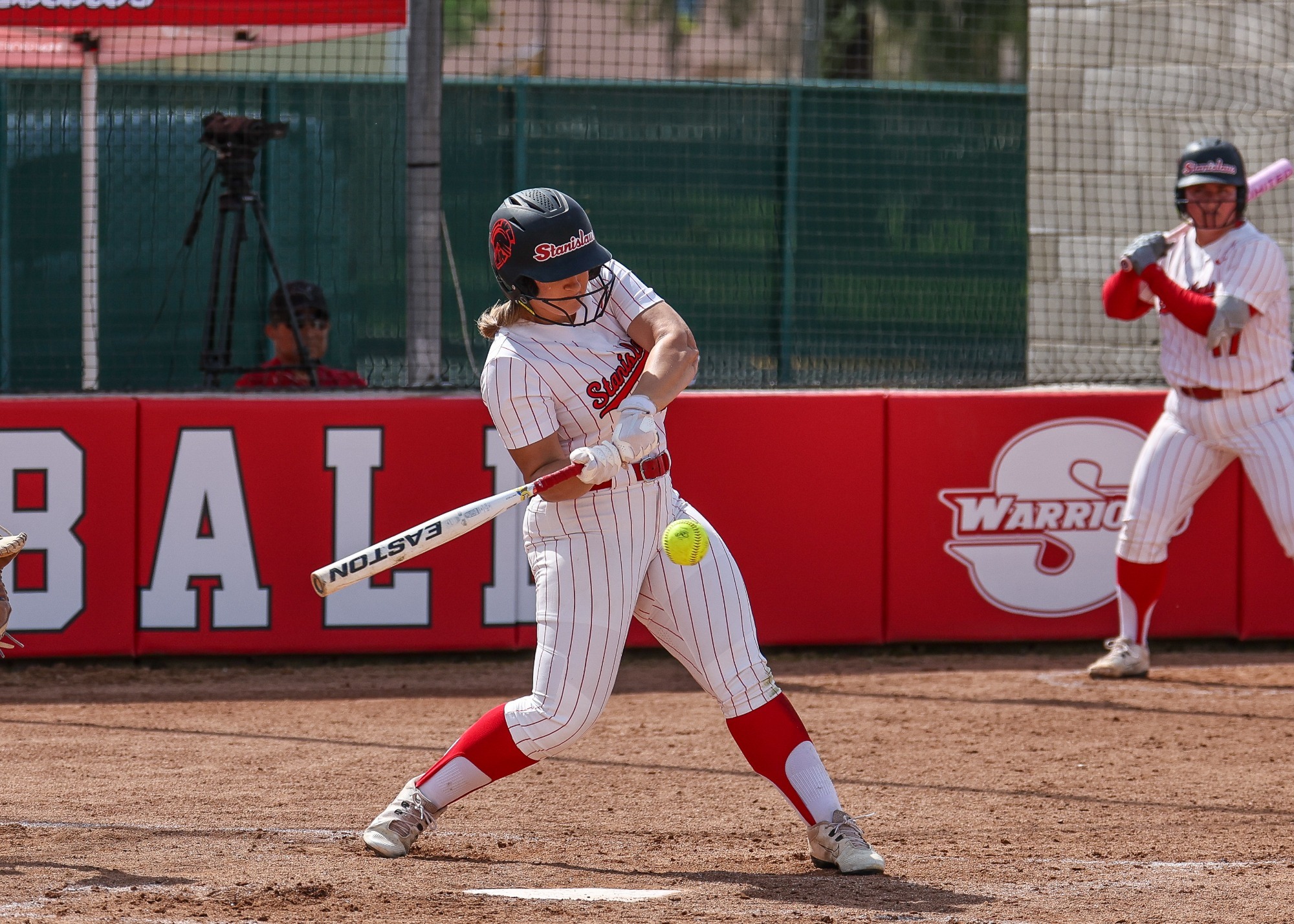 Addie Meddings hitting in a recent game at Warrior Field
