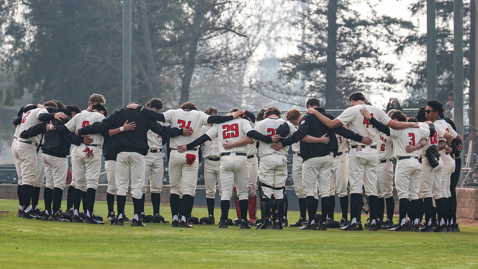 Warriors in a huddle prior to a recent game at Warrior Field