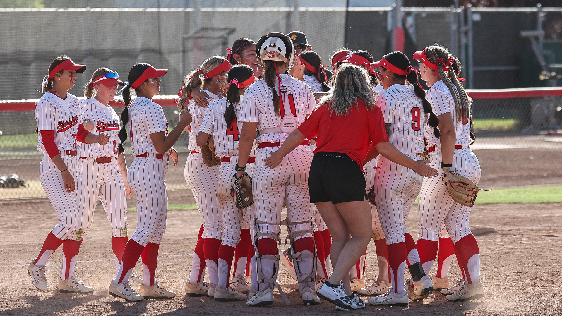 Softball Celebrating after a recent victory at Warrior Field