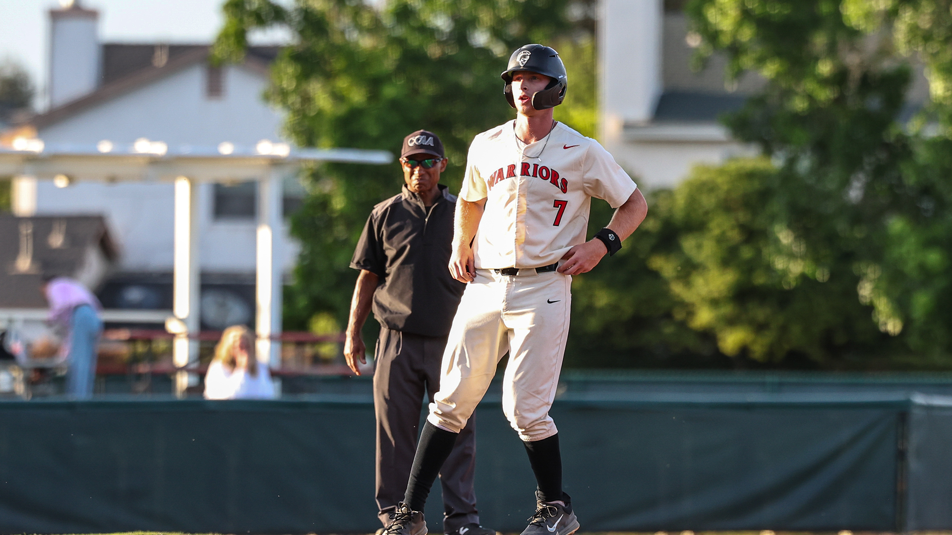 Mason Kelley leads off from the basepath during a Stan State baseball game.