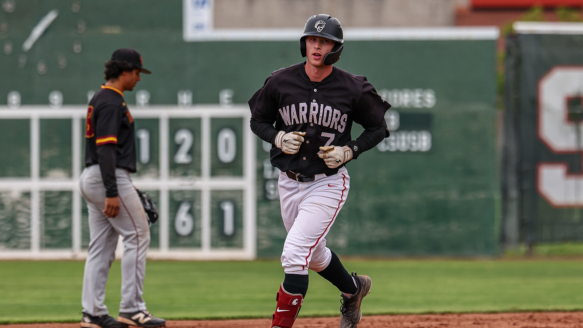 Mason Kelley running around the bases after hitting a home run in last week's Senior Day