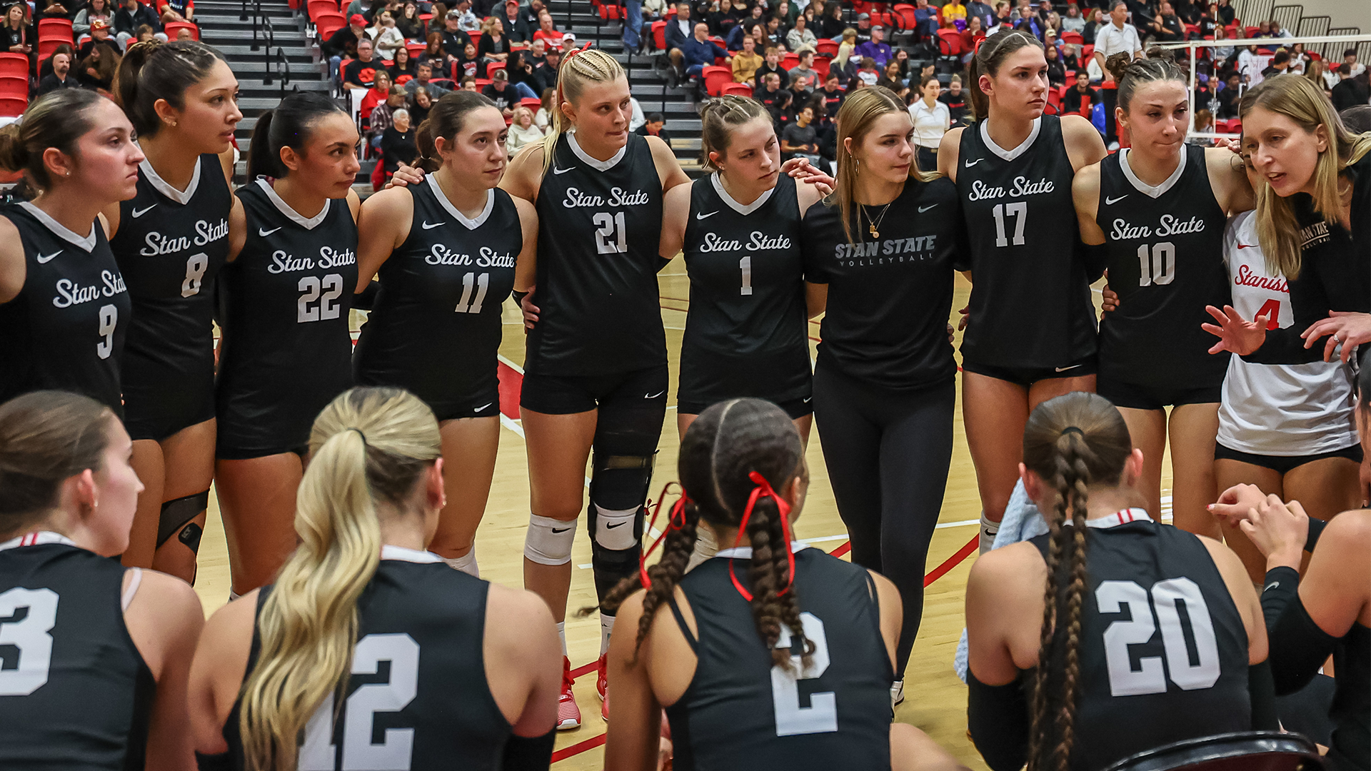 Volleyball in a huddle during a time out at last year's CCAA VB Tournament