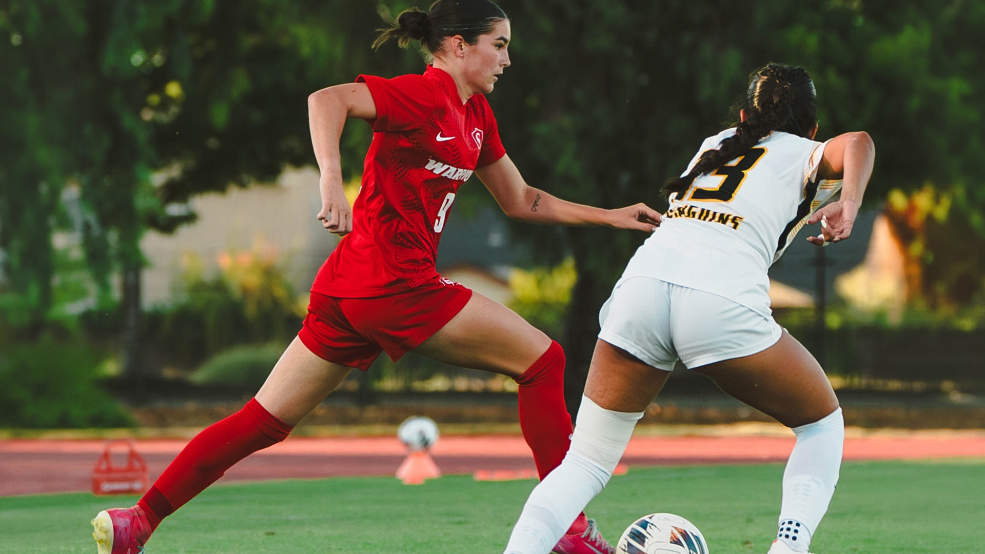 action shot of Kyndra Obermeyer at a recent home match