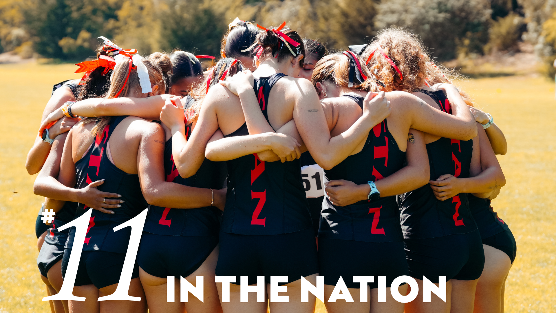 WXC Team in a huddel and #11