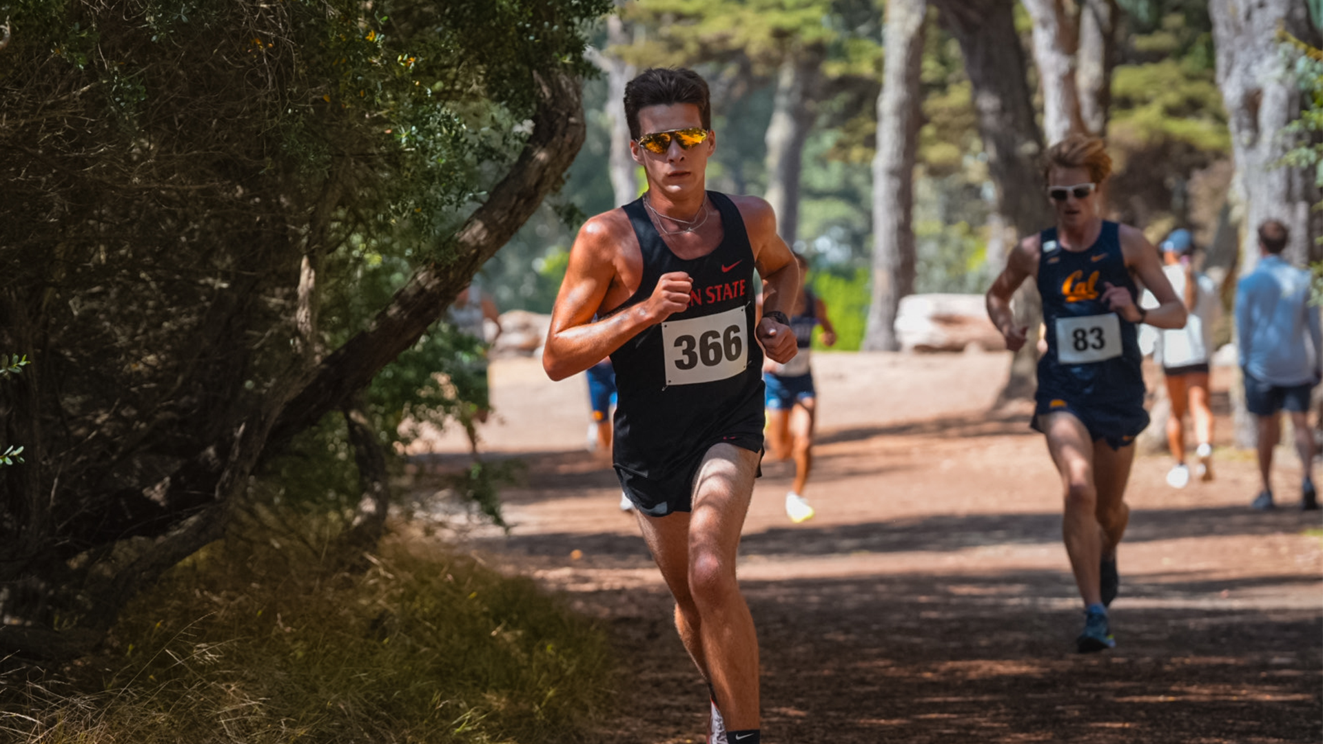 action shot of Jackson Oliveira running at USF Invite