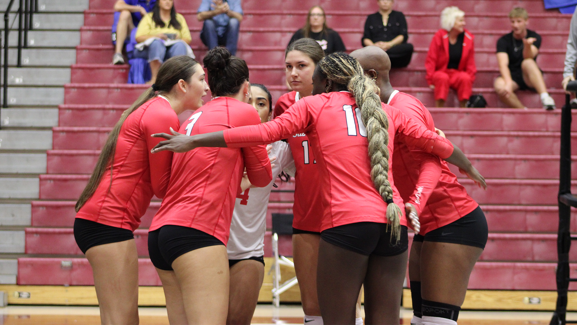 Huddle shot of Warrior volleyball at a recent match