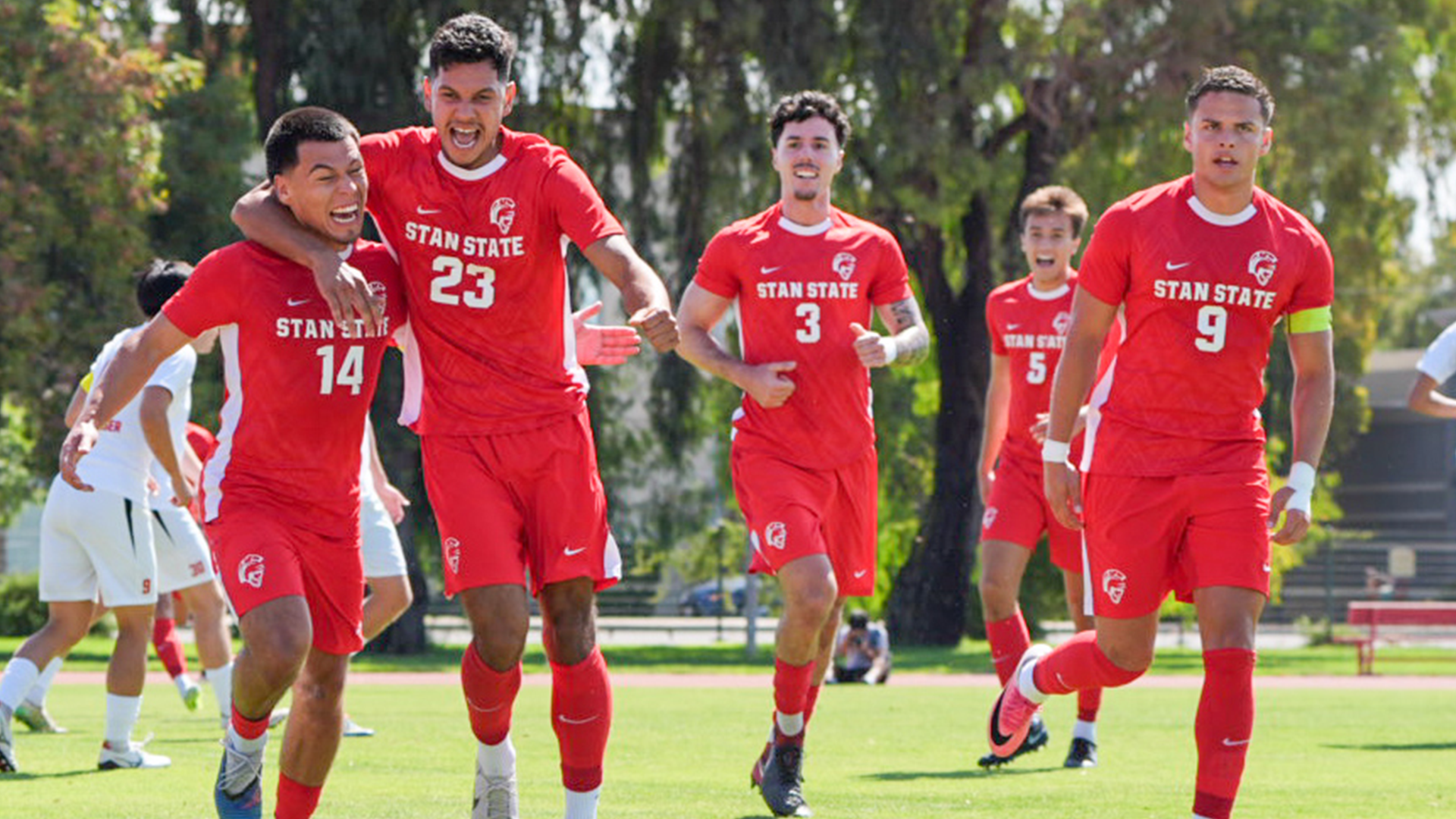 Action shot of Men's Soccer Celebrating at a recent match