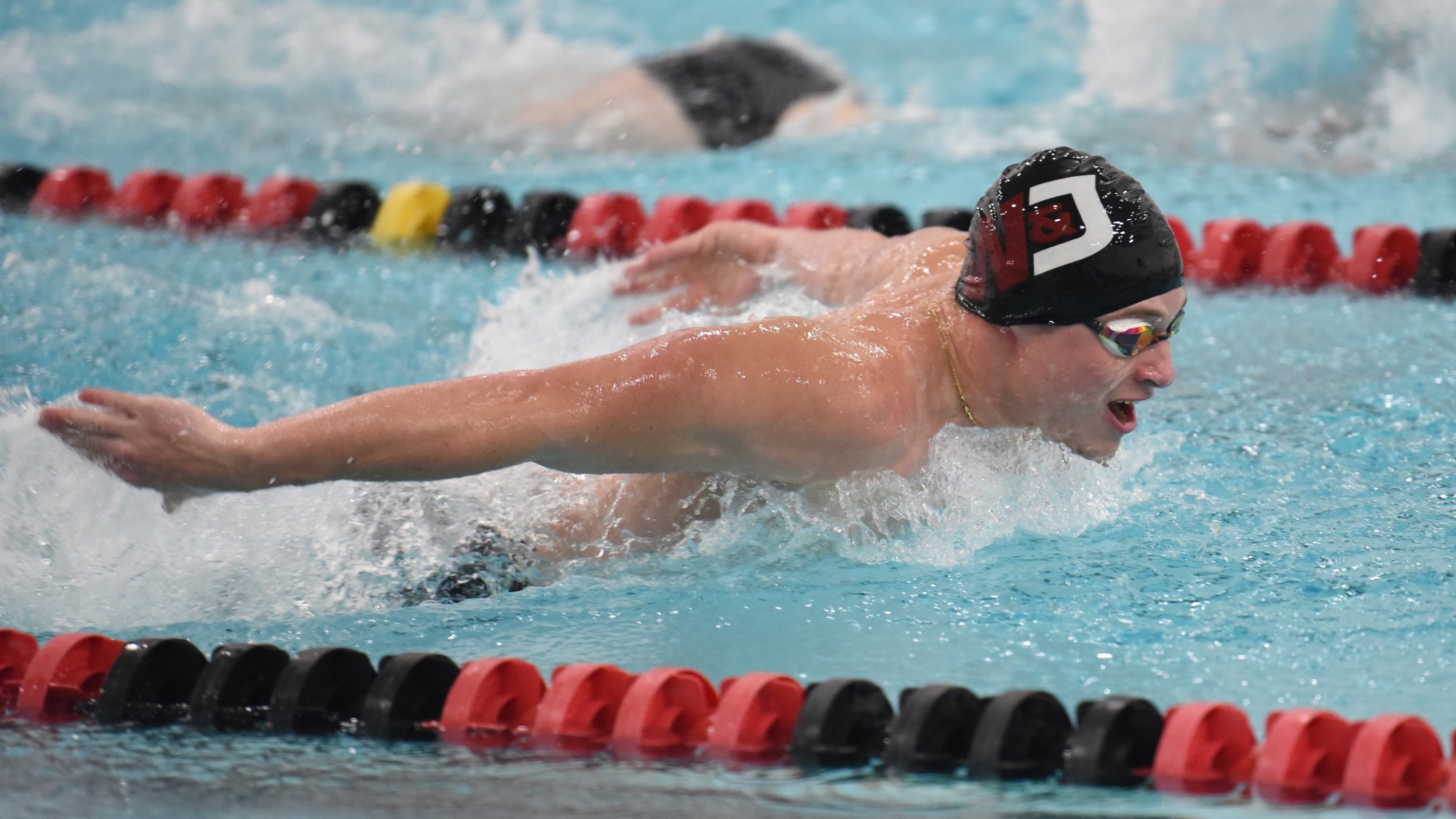 An unidentified W&J swimmer competes in a meet vs. Pitt Bradford in January of 2024