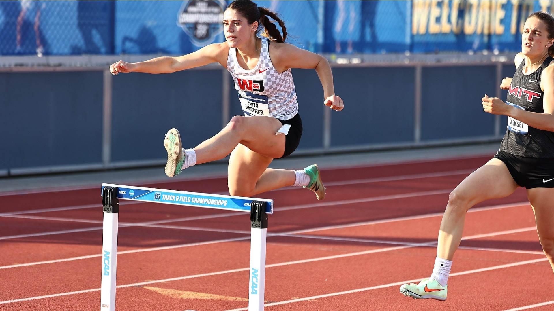 Jadyn Hartner jumps over a hurdle during the 400 Hurdles at the 2024 NCAA Outdoor Championships