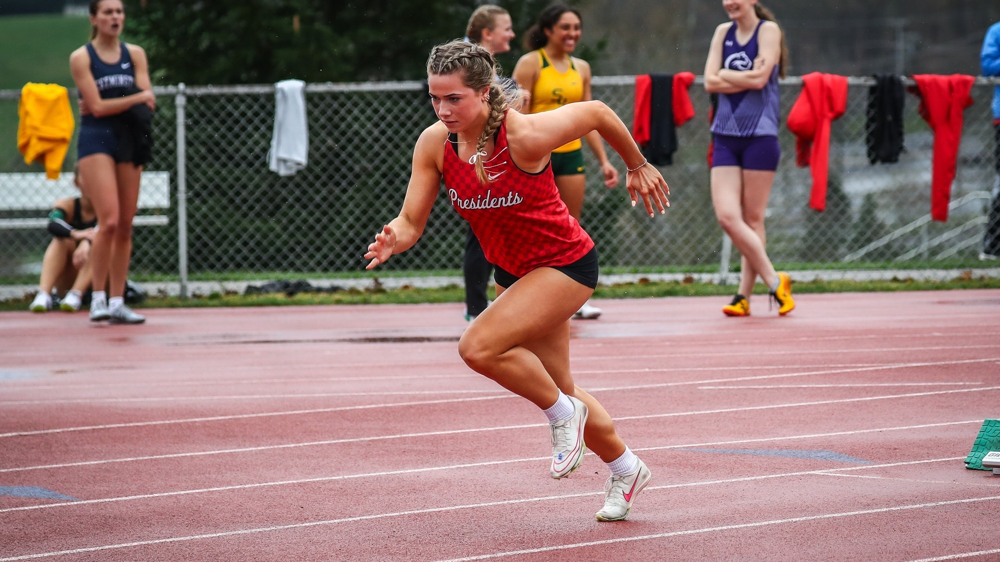 Lainey Hartner during track events at Slippery Rock University Outdoor Track