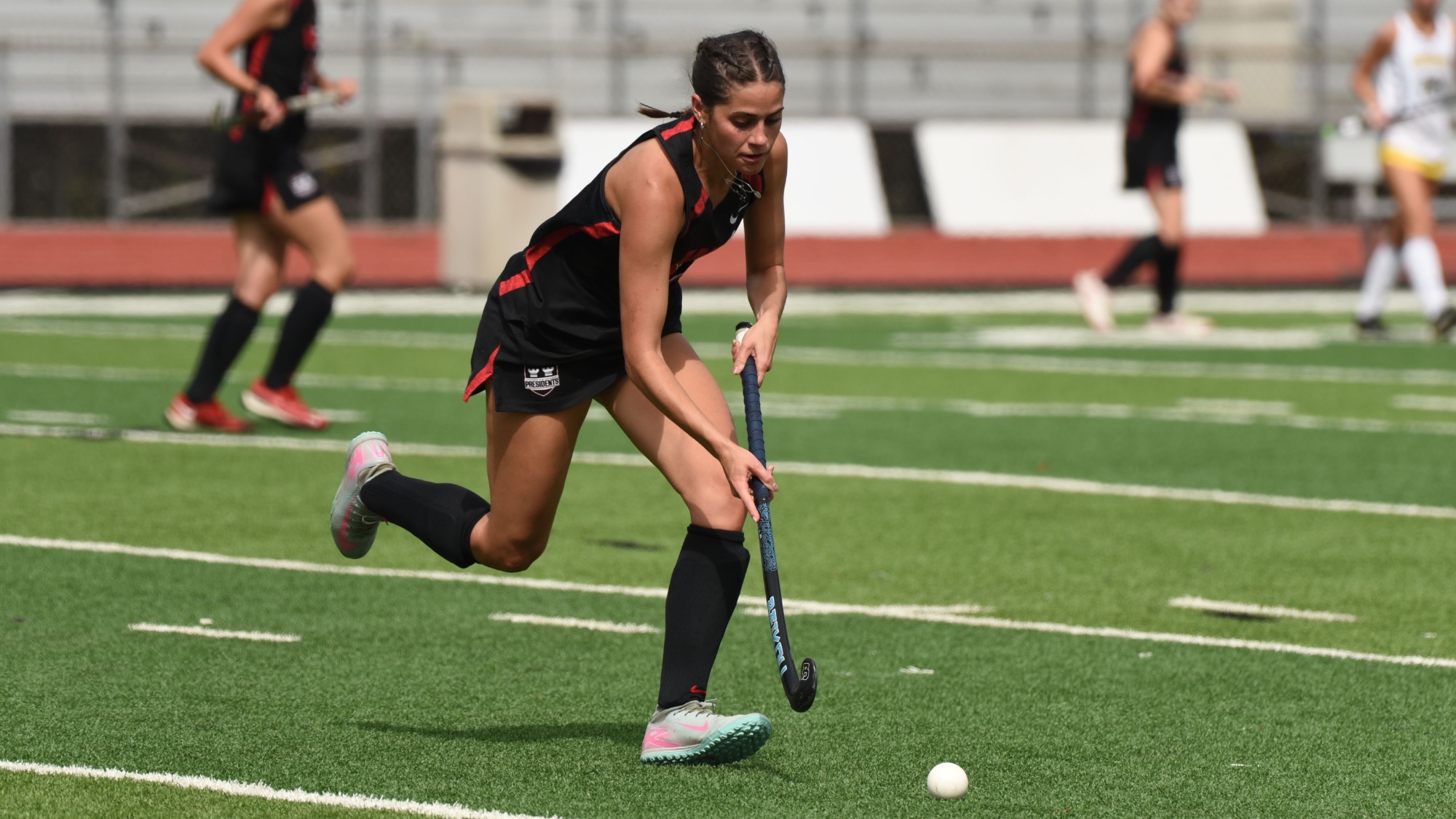 Riley Dortenzo carries the ball in a 2025 game versus DePauw