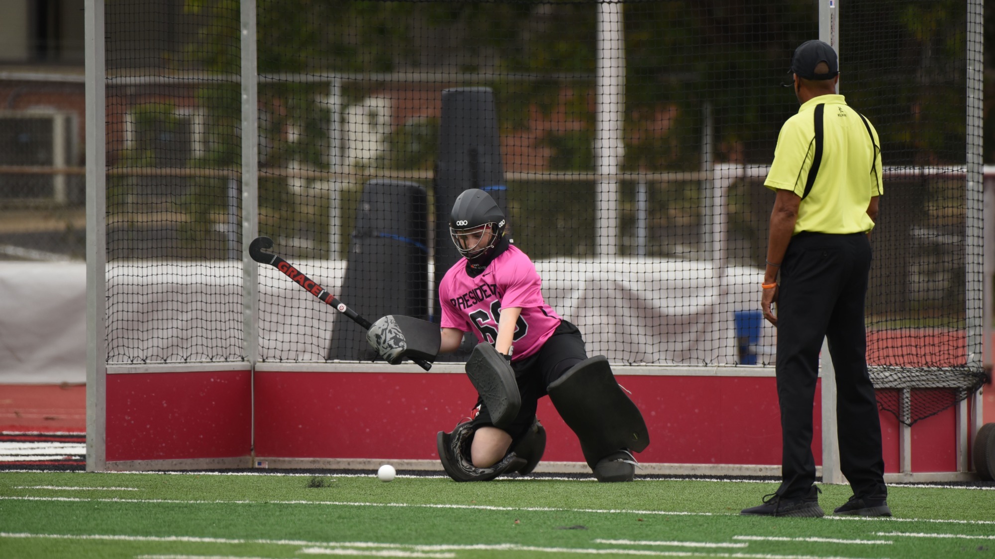 Grace Erhard makes a save on a penalty stroke attempt in a 2025 game versus DePauw
