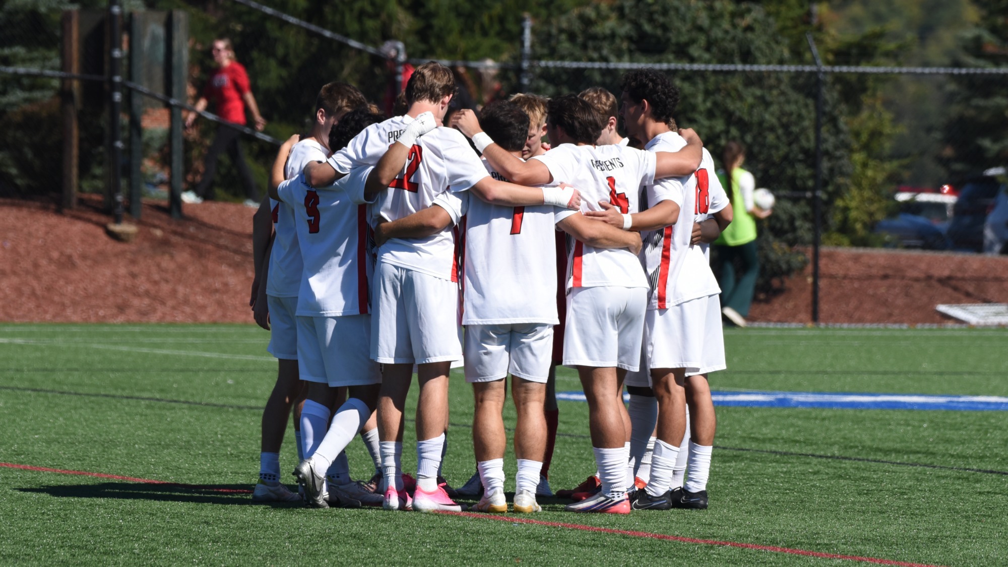 Men's Soccer huddles during the 2026 senior day match vs. Geneva