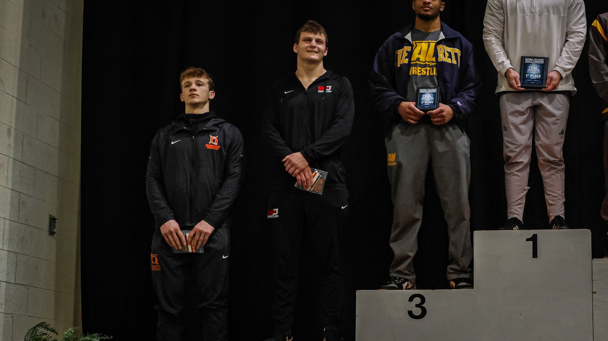 Vitali Daniel Podium Photo at the 2025-26 NCAA Regionals