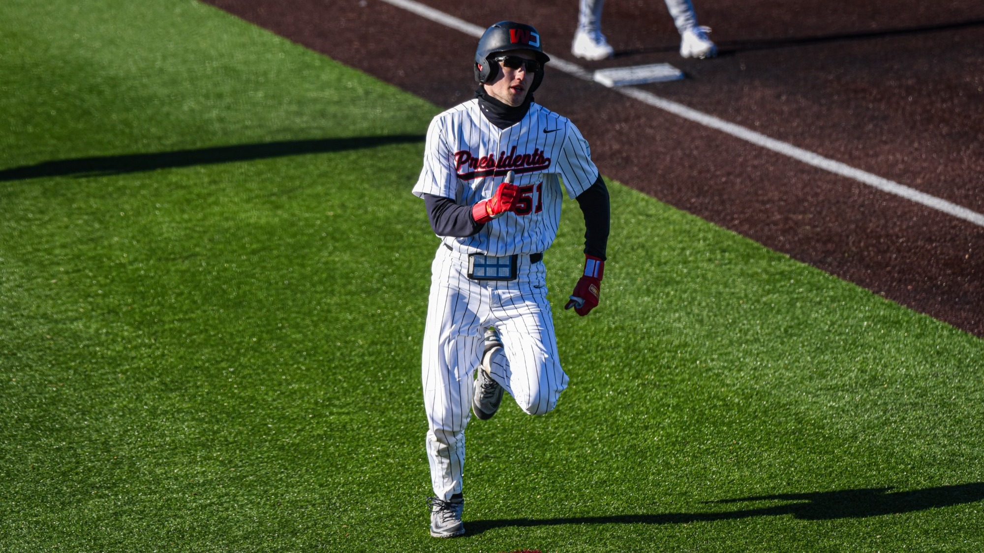 Zac Stern rounding third against #11 CWRU 2026