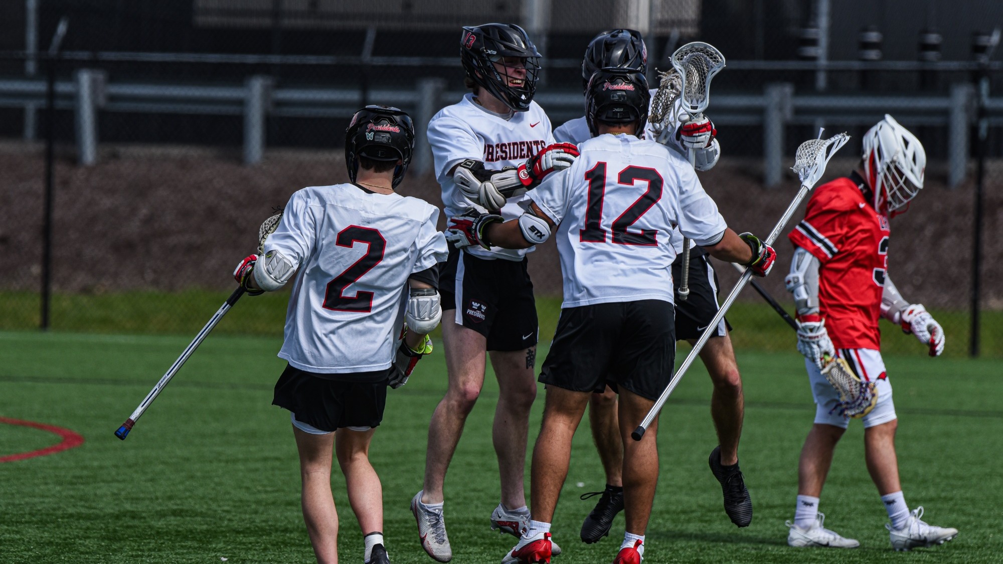 Men's Lacrosse Celebrating a goal vs La Roche 2026