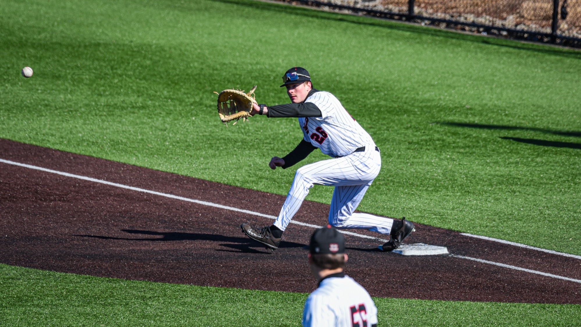 Josh Dezenzo Action Shot vs CWRU at First Base 2
