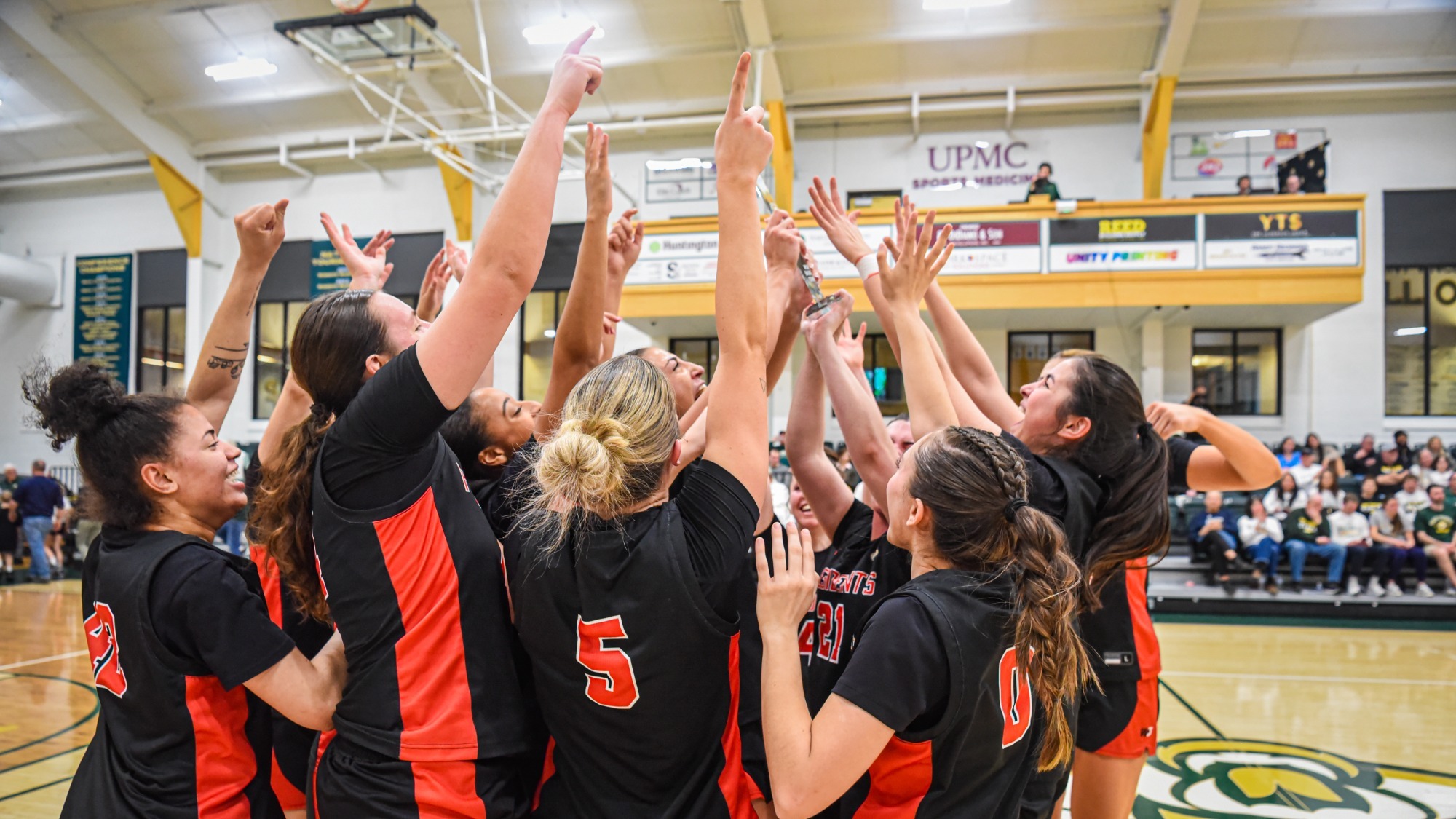 Women's Basketball holding the 2025-26 PAC Championship Trophy