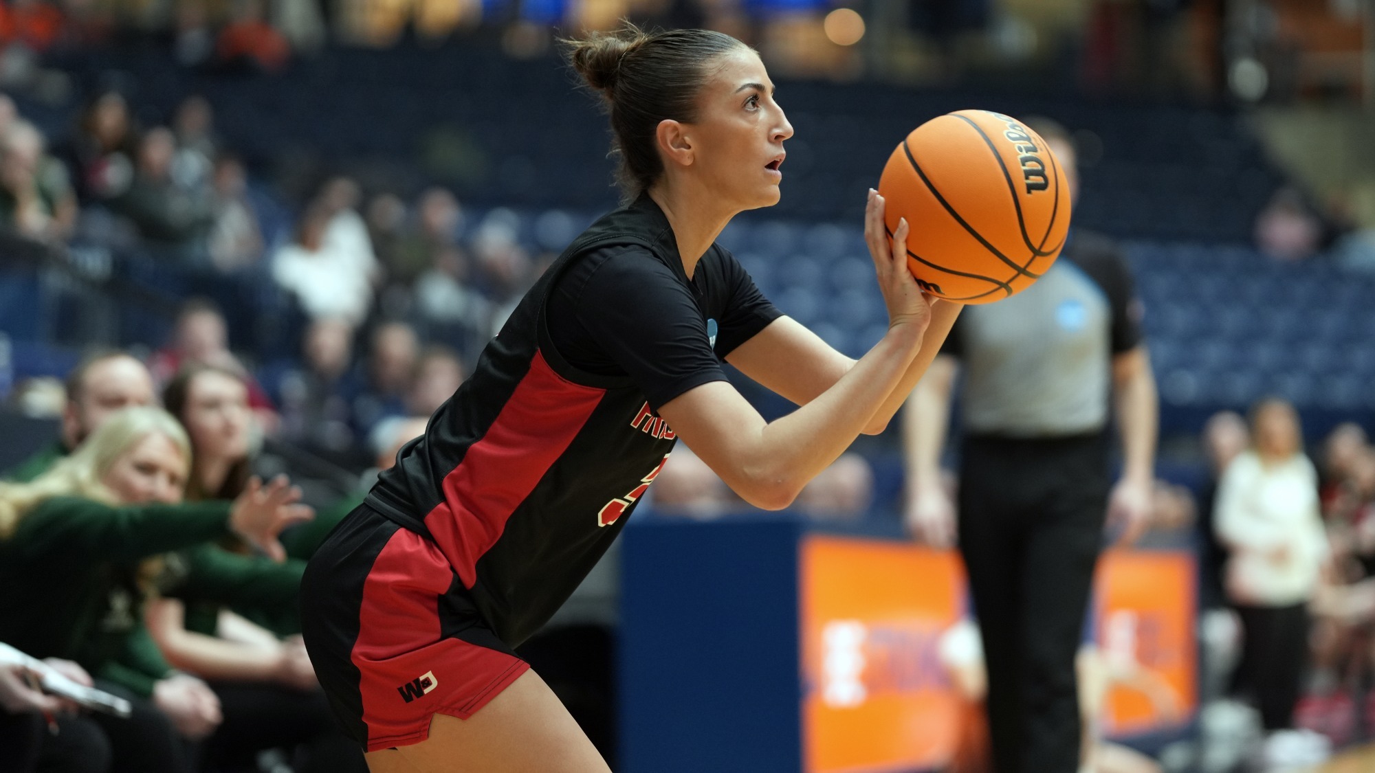 Stellanie Loutsion readies herself for a three-point shot in an NCAA Tournament game versus Illinois Wesleyan at Hope College. 