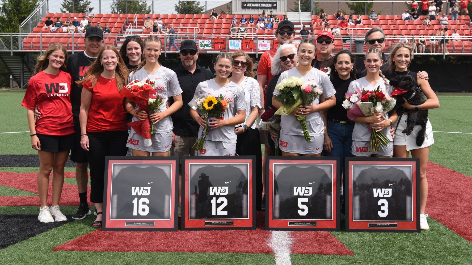 2026 WLAX Seniors pose for a photo on Senior Day 