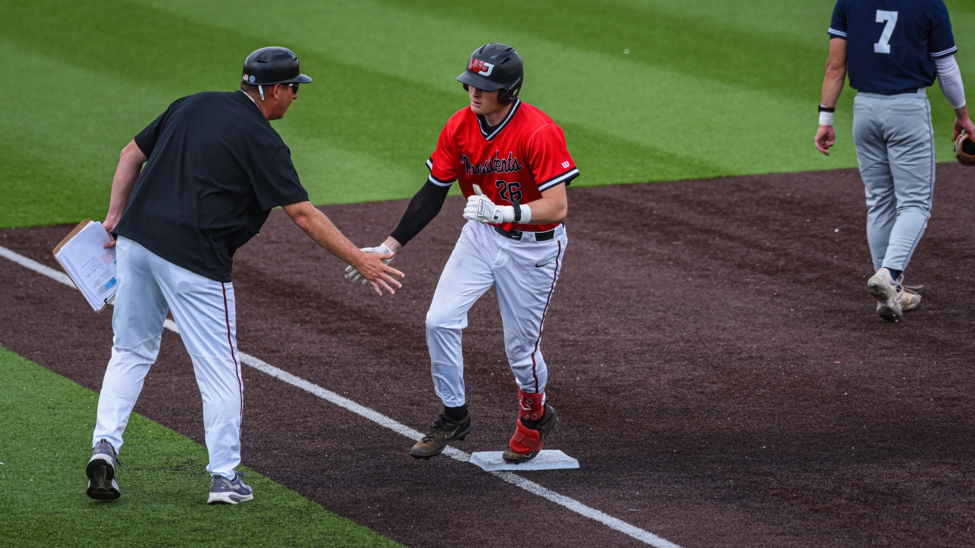 Josh Dezenzo rounding third vs Allegheny 2026