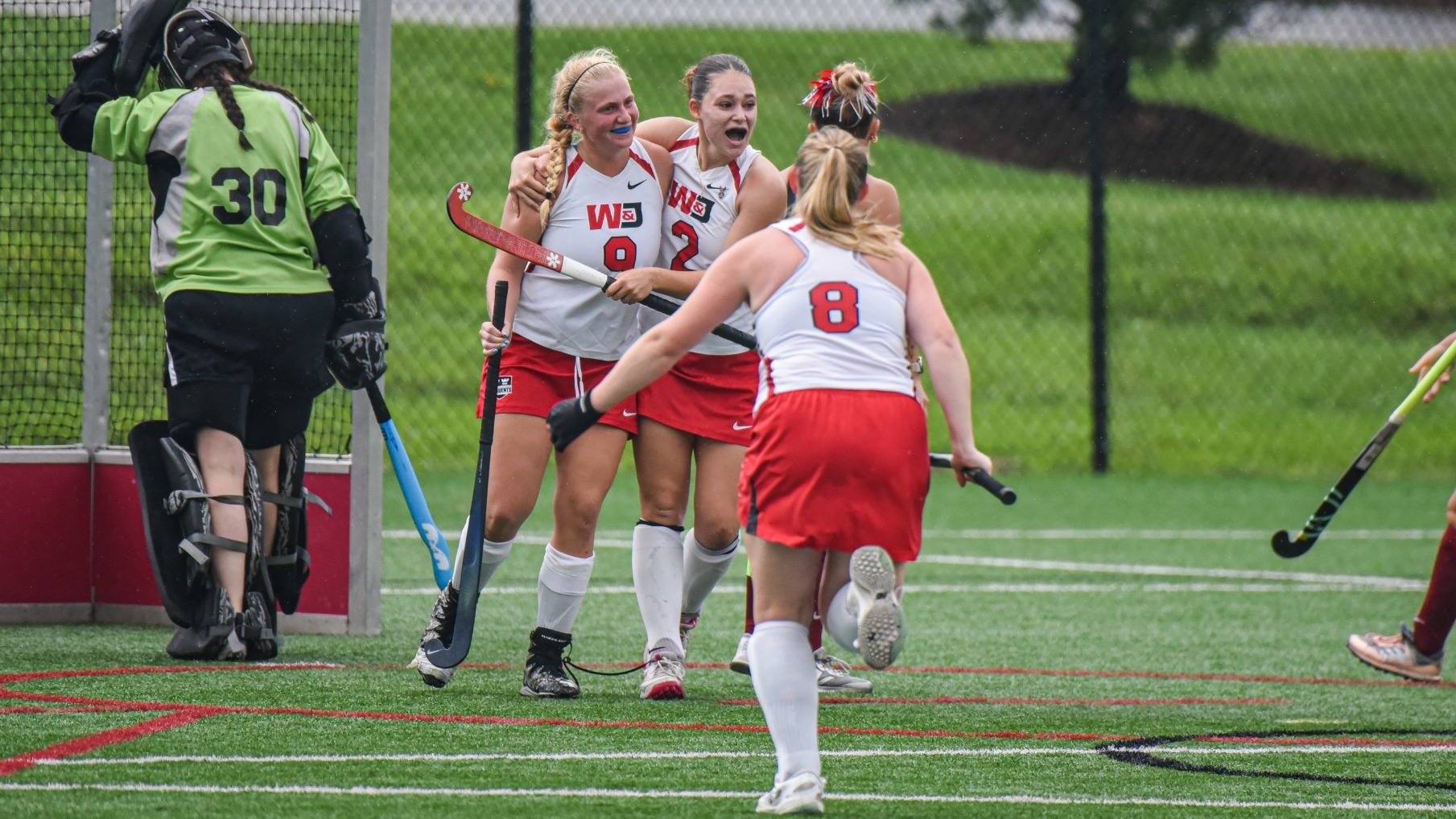Avery Byard and Capriana Romano celebrate goal against Transy 2026 at Alexandre Stadium