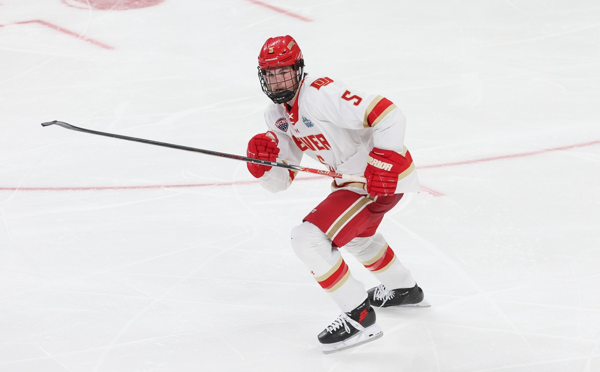 LAS VEGAS, NEVADA - APRIL 11: Garrett Brown #5 of the Denver Pioneers skates against the Wisconsin Badgers in the second period during the NCAA Division I Men's Ice Hockey Frozen Four final at the T-Mobile Arena in Las Vegas, Nevada on April 11, 2026. The Pioneers won 2-1. (Photo by Richard T Gagnon/Getty Images)