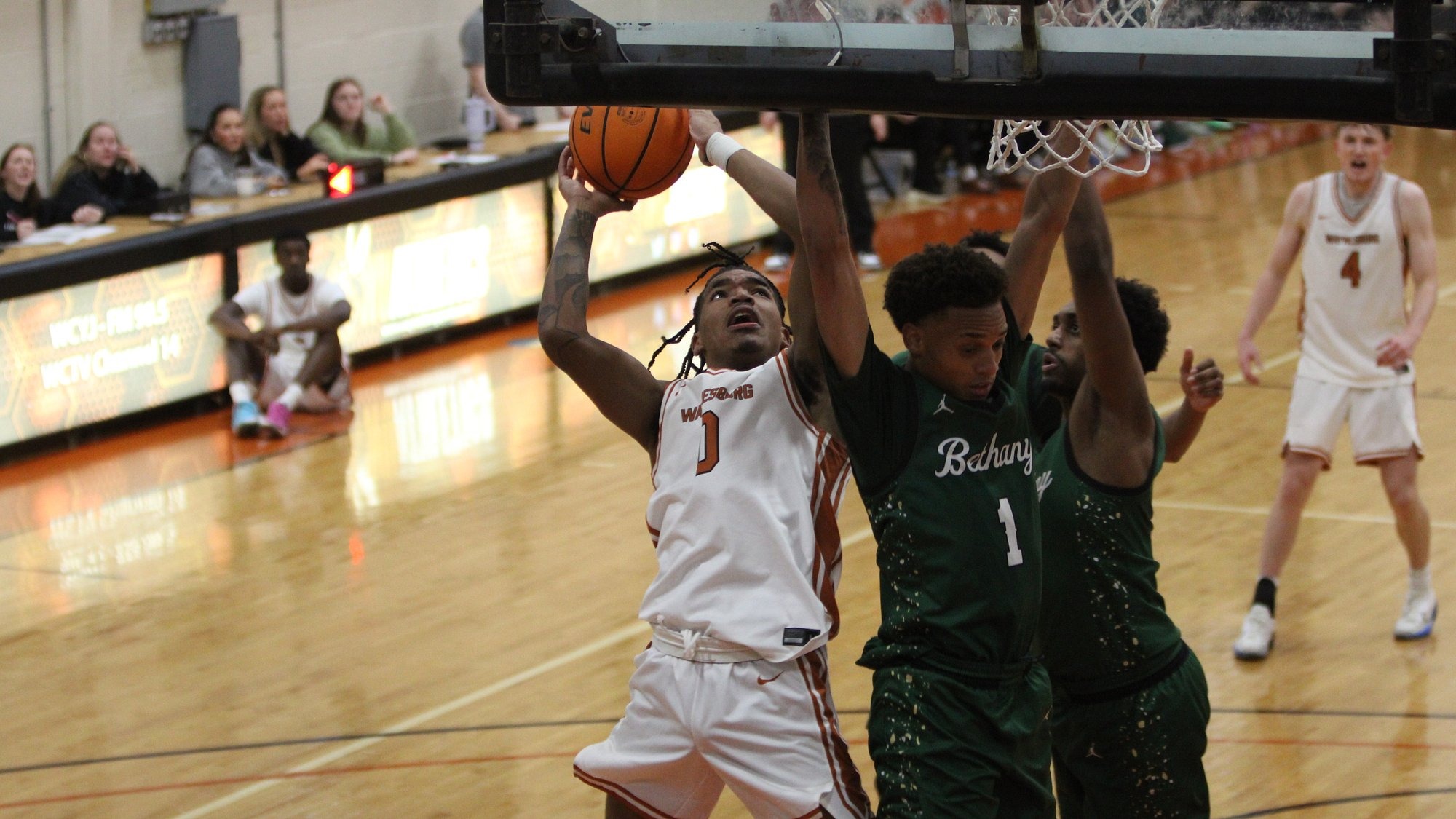 Mikey Smith attacks the glass