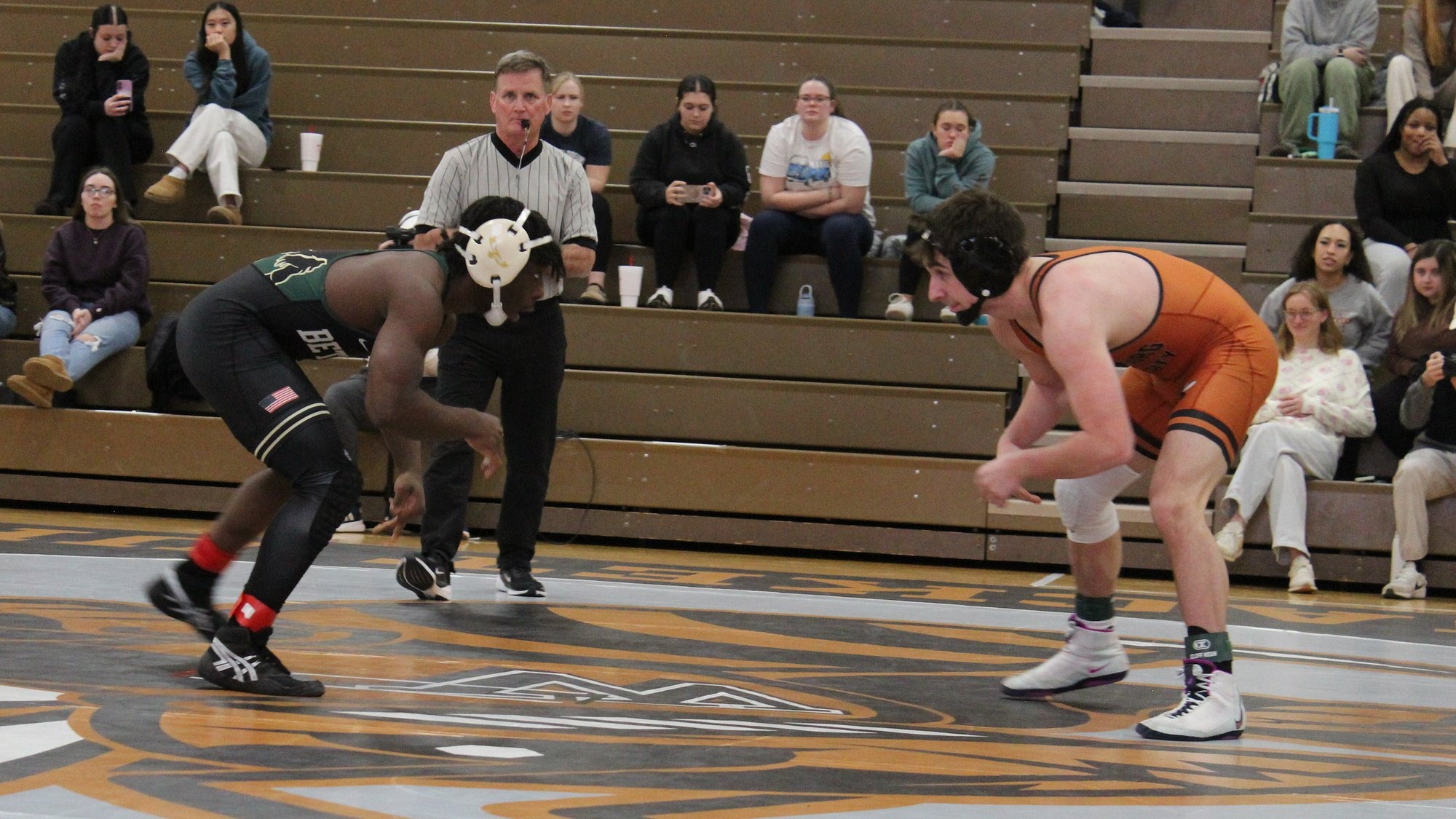 JT Hollyfield wrestling on his feet against Bethany