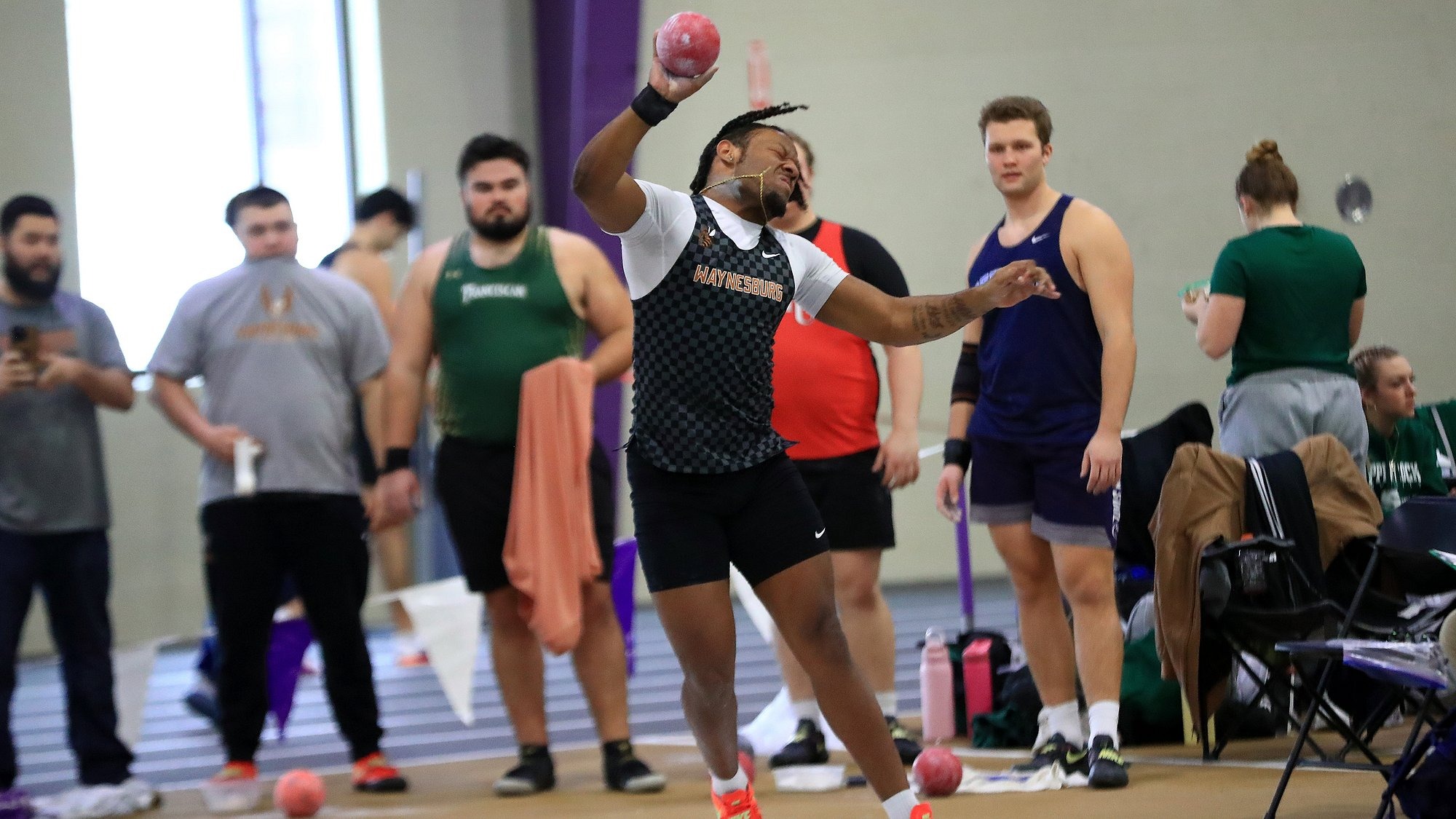 Stewart throwing the shot put