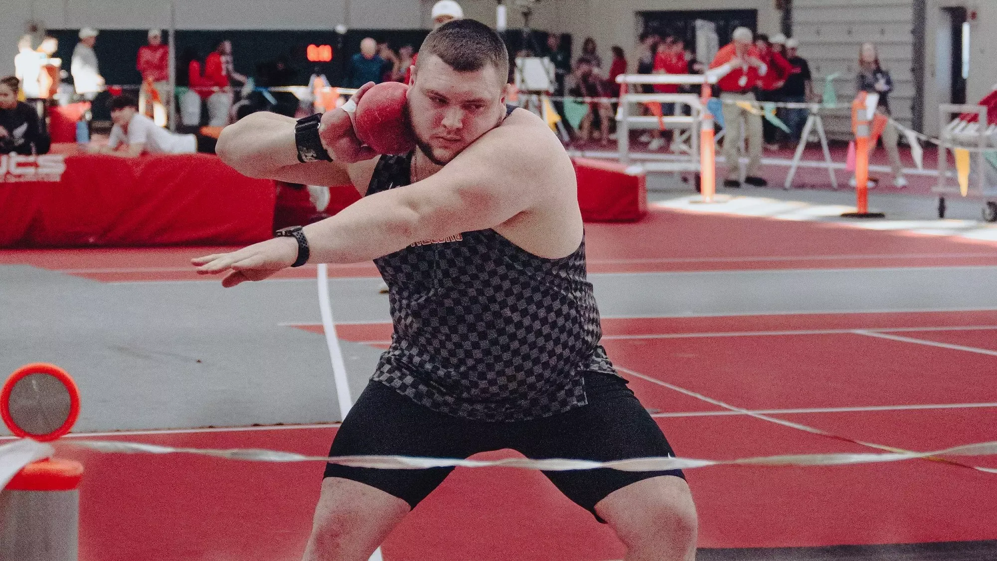 Jacob Harker getting ready to throw the shot put