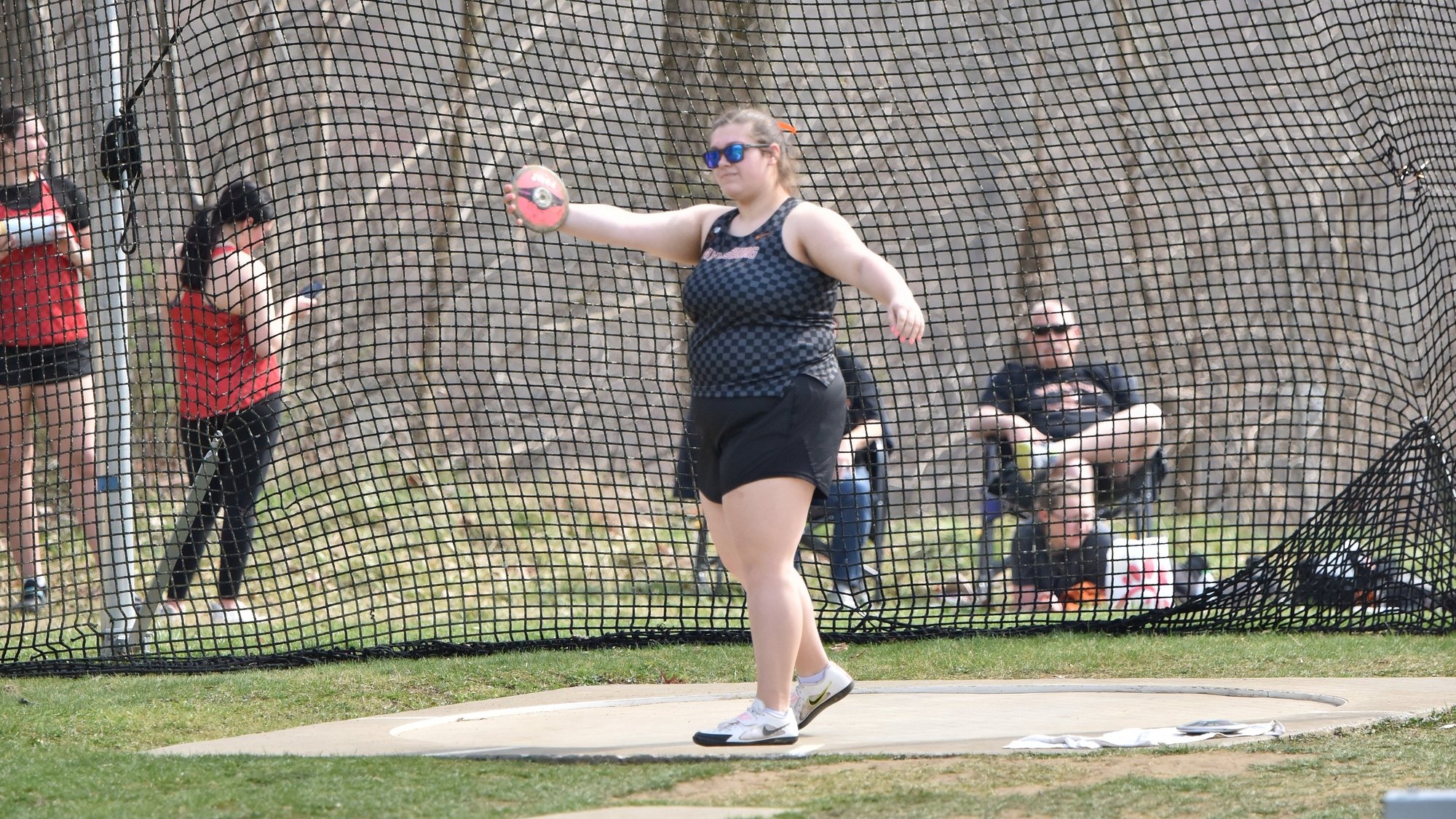 Chico competing in the discus