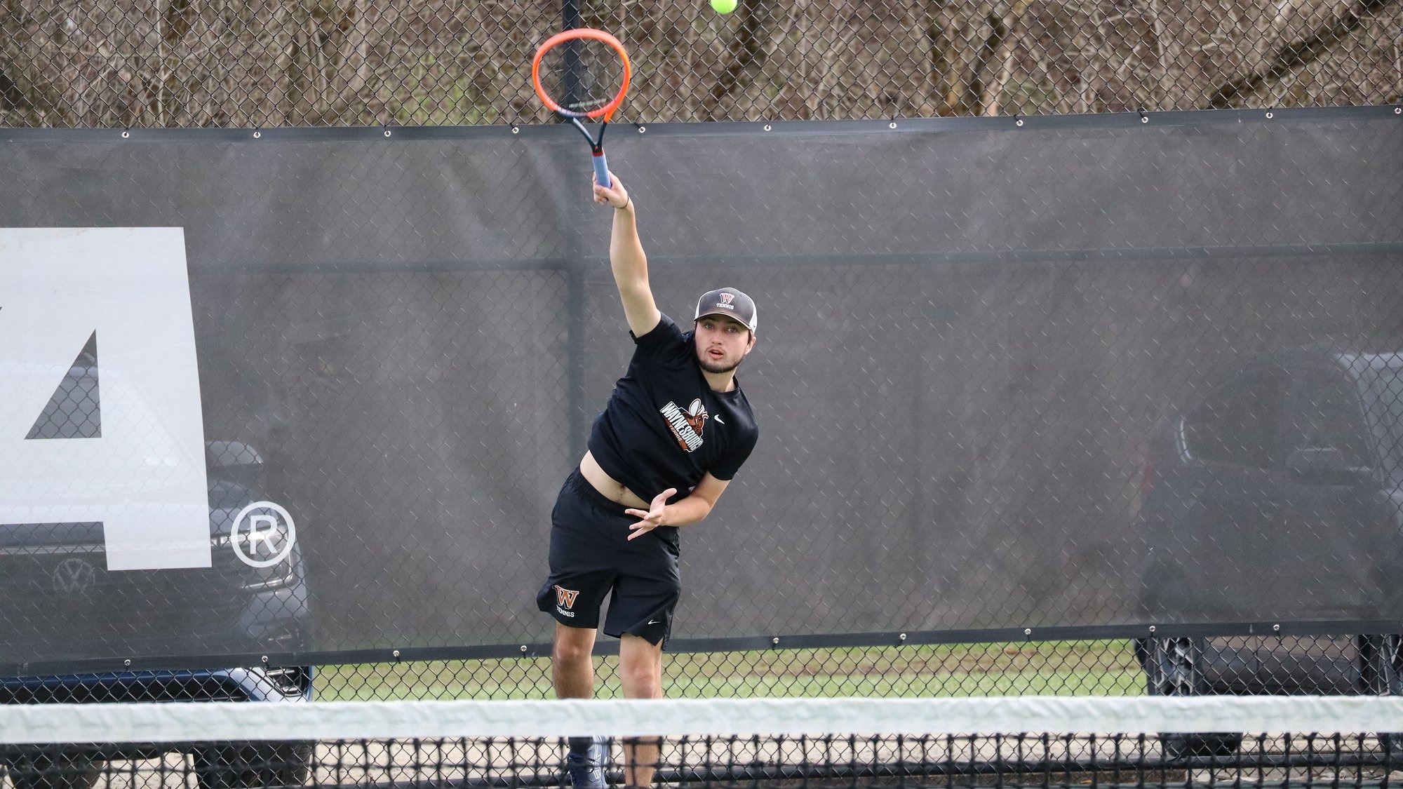 Pohuski playing tennis