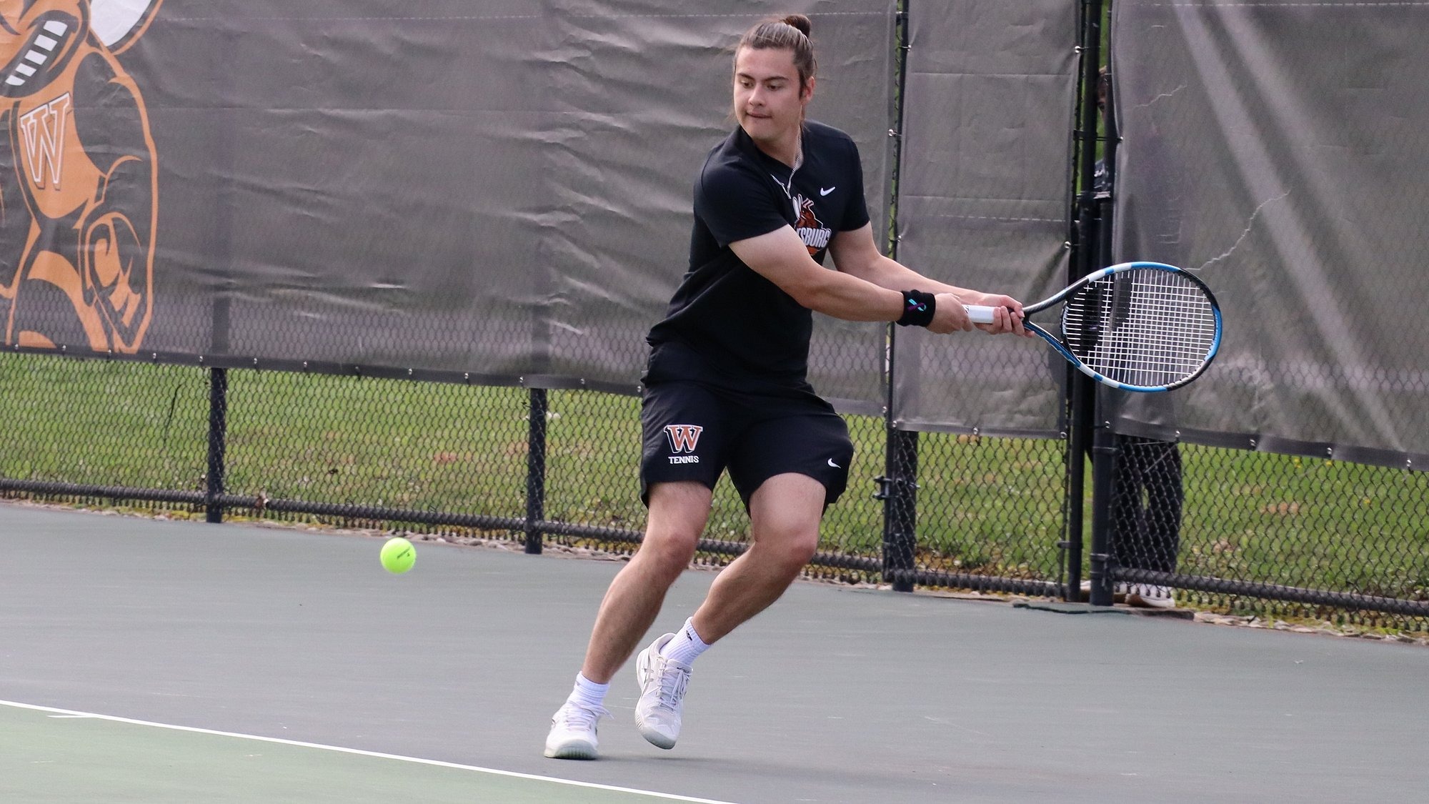 Tyler Gordon Playing Tennis