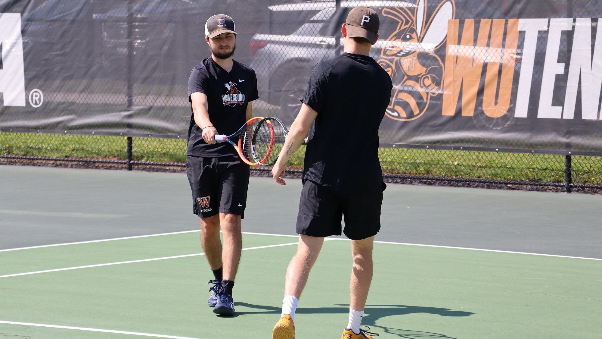 Waynesburg Men's Doubles Players Congratulating Each Other