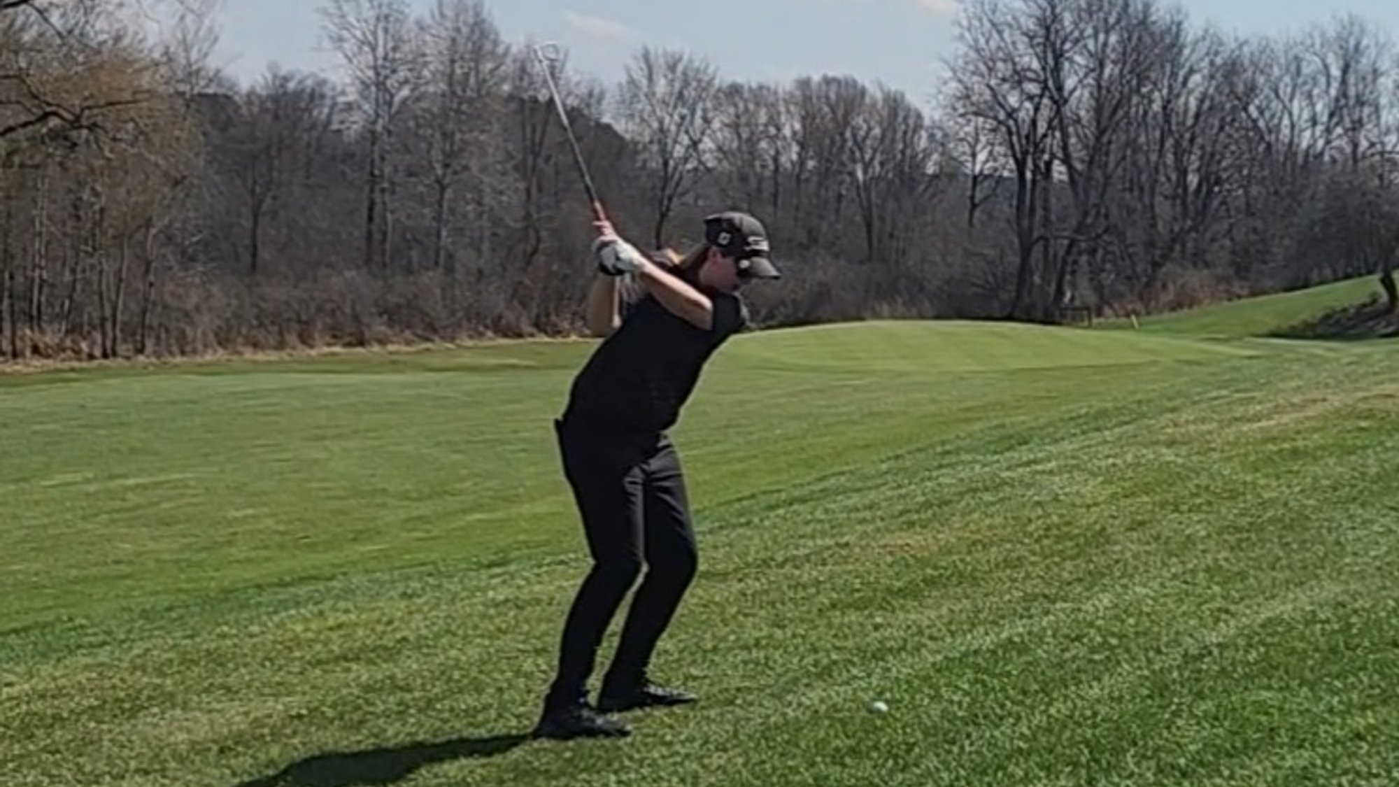 Allison Wolling hitting a shot from the fairway