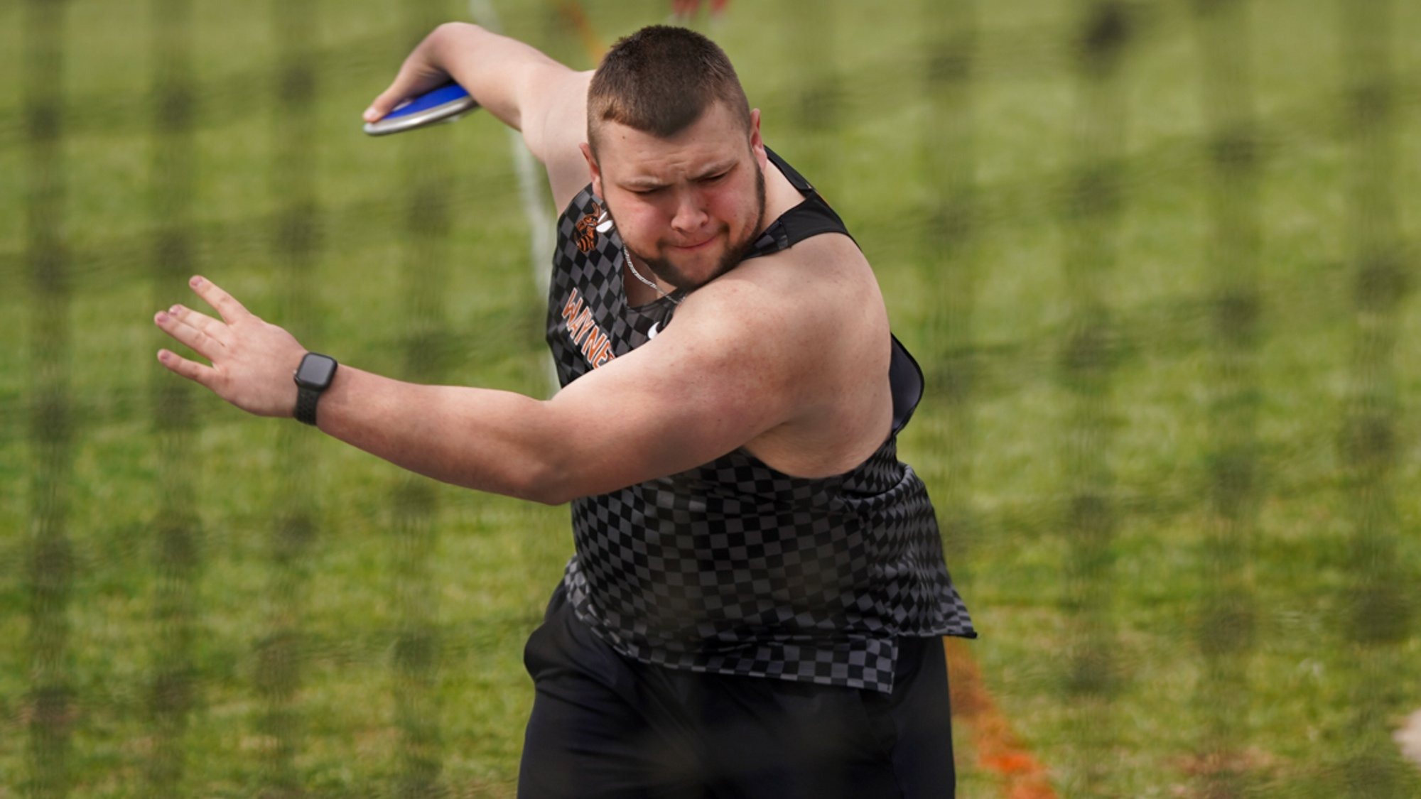 Harker throwing the discus