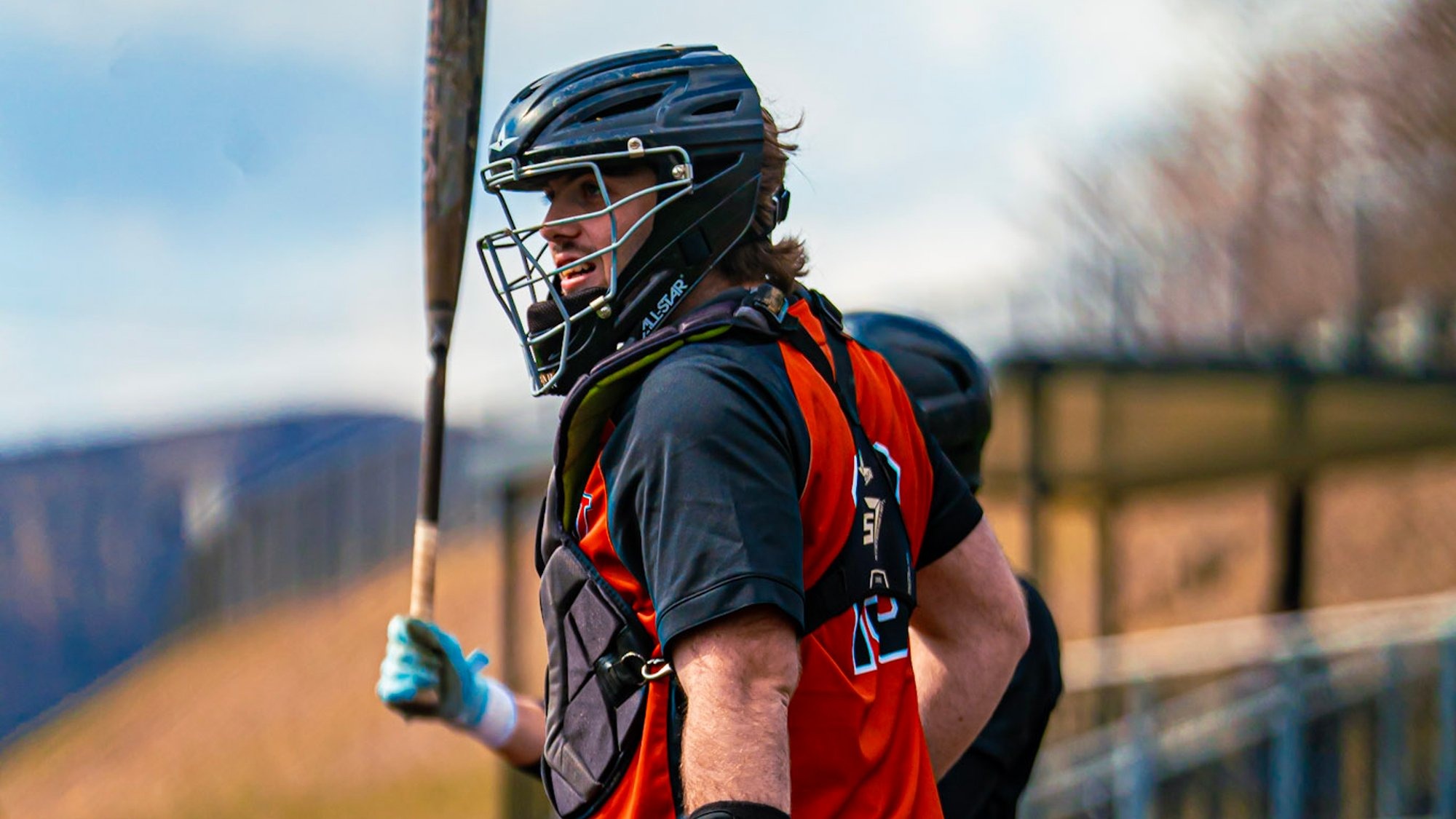 Catcher Hunter Mamie looks towards the dugout