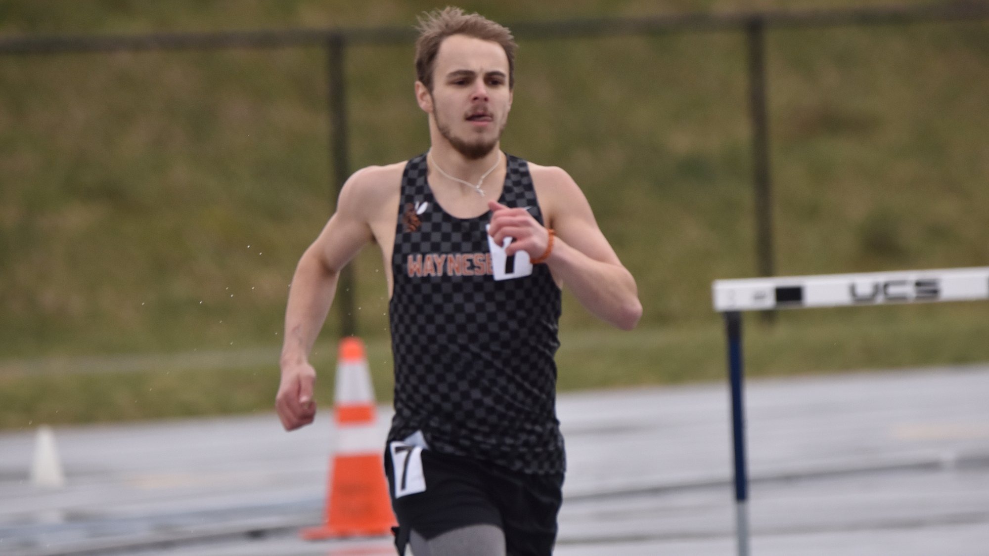 Nicky Todd running in the rain